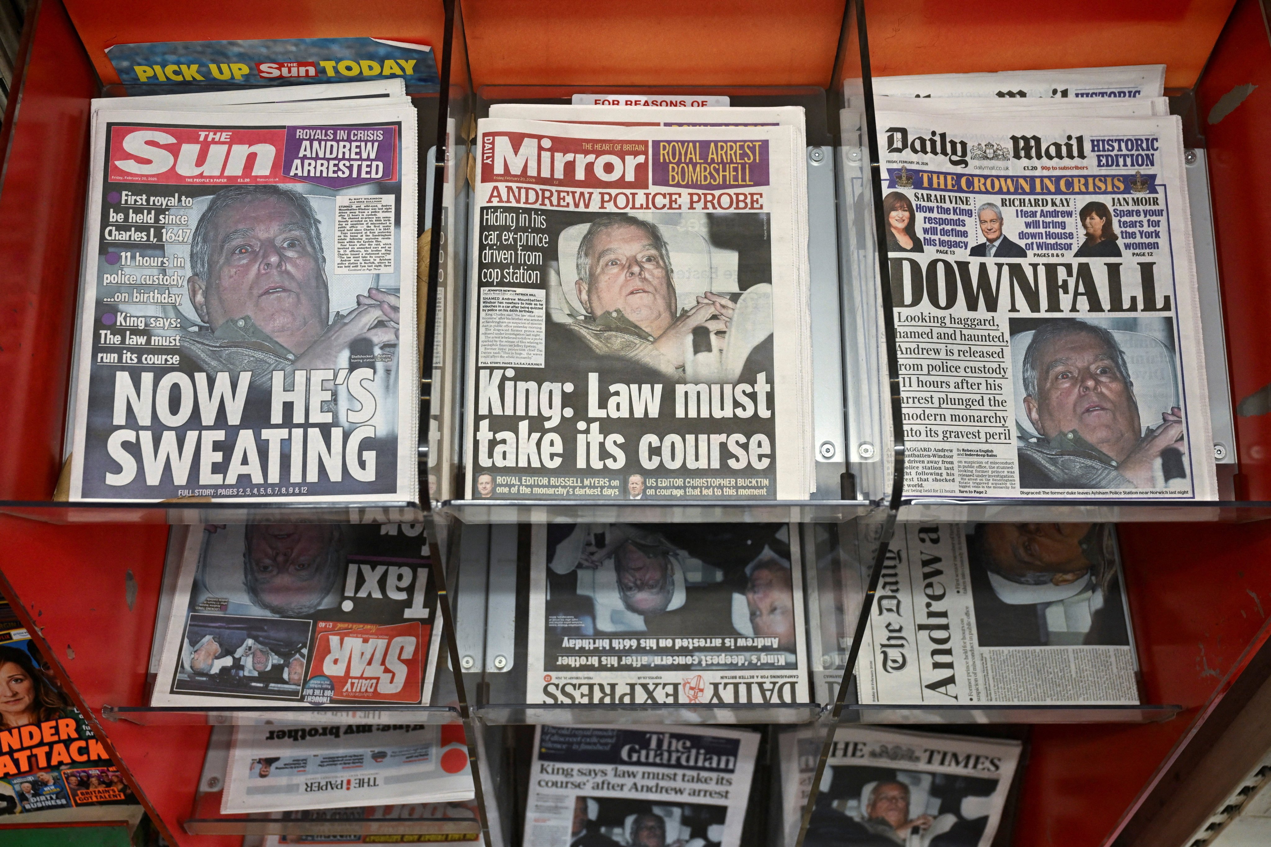 Newspapers featuring coverage of the arrest of Andrew Mountbatten-Windsor are displayed at a newsagent in Egham near Windsor on Friday. Photo: Reuters