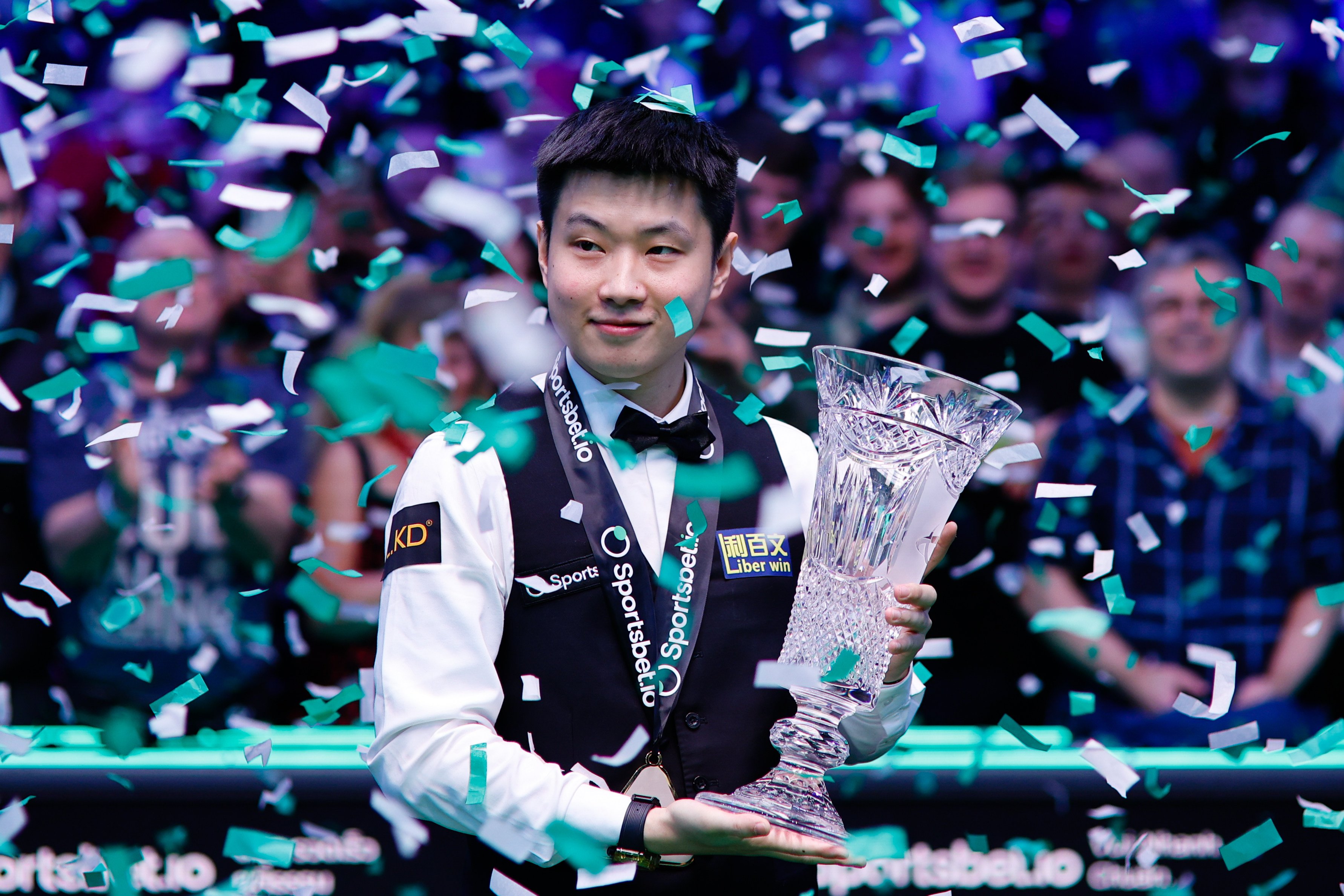 The in-form Zhao Xintong celebrates beating John Higgins 10-7 to capture his fifth career ranking title at the Players Championship. Photo: Getty Images