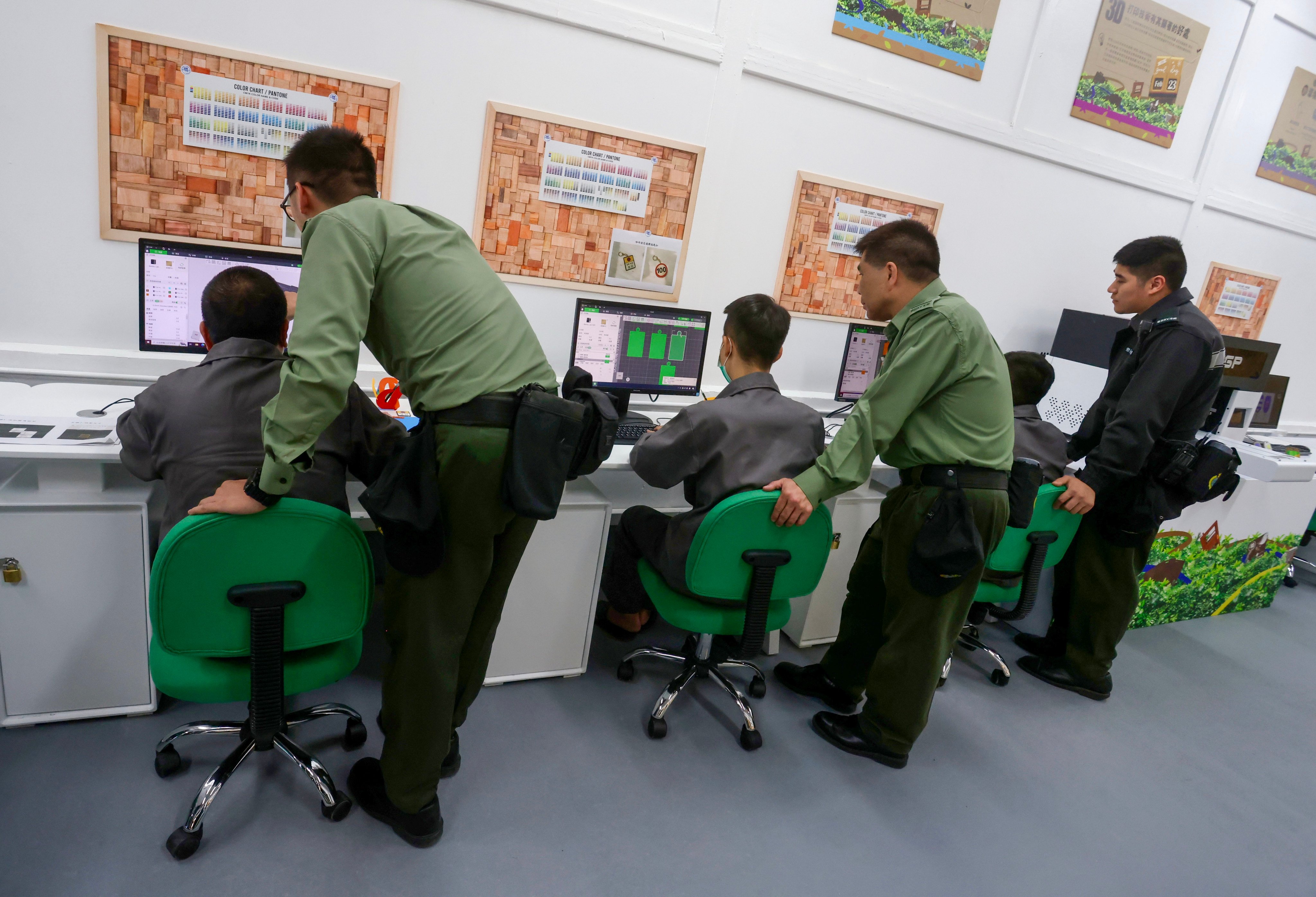 Inmates access computers during a media tour of a Hong Kong prison. Photo: Jonathan Wong