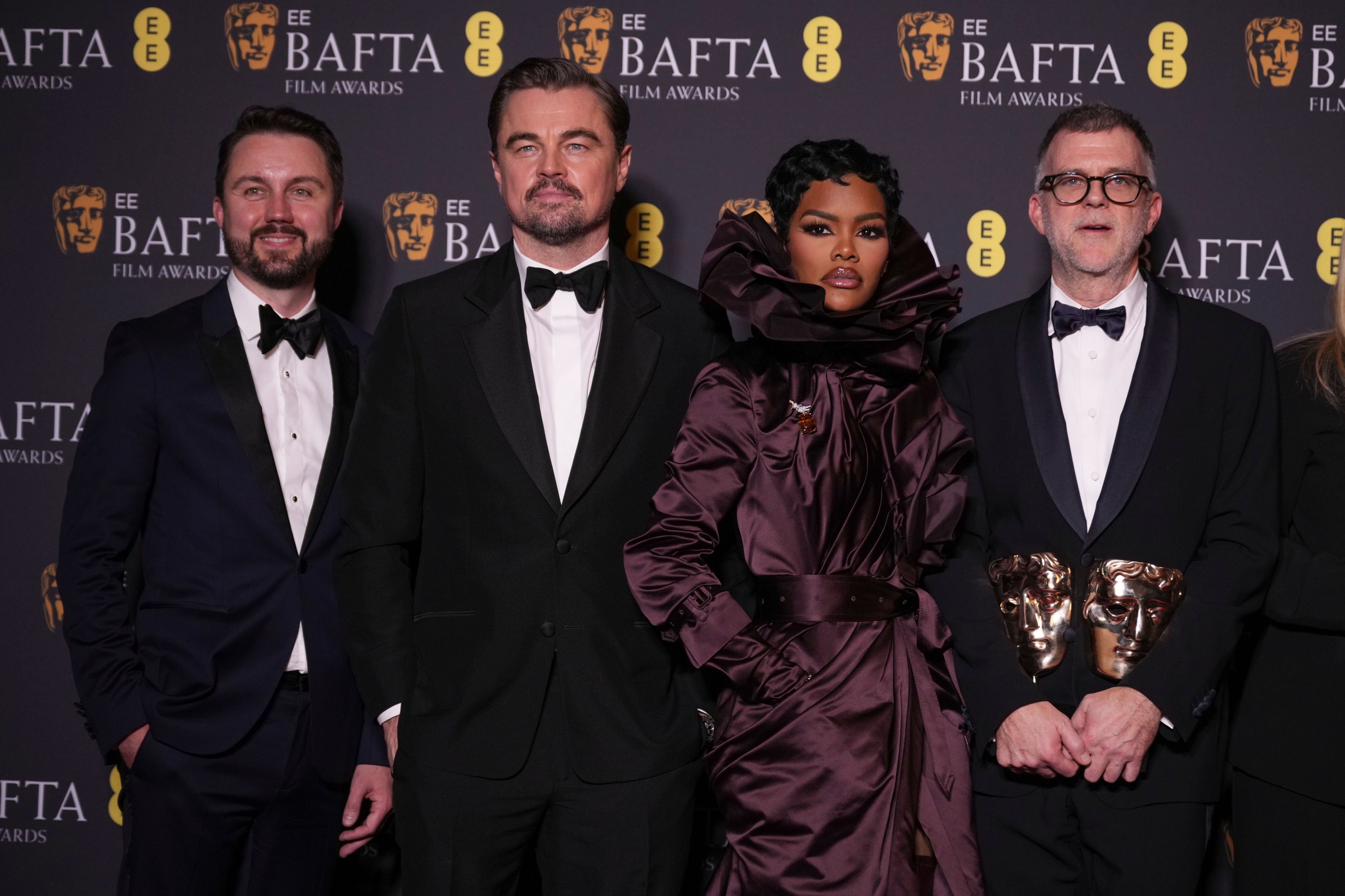 From left, Andy Jurgensen, Leonardo DiCaprio, Teyana Taylor and Paul Thomas Anderson with the awards for best director, cinematography and adapted screenplay for One Battle After Another at the Baftas in London on Sunday. Photo: AP