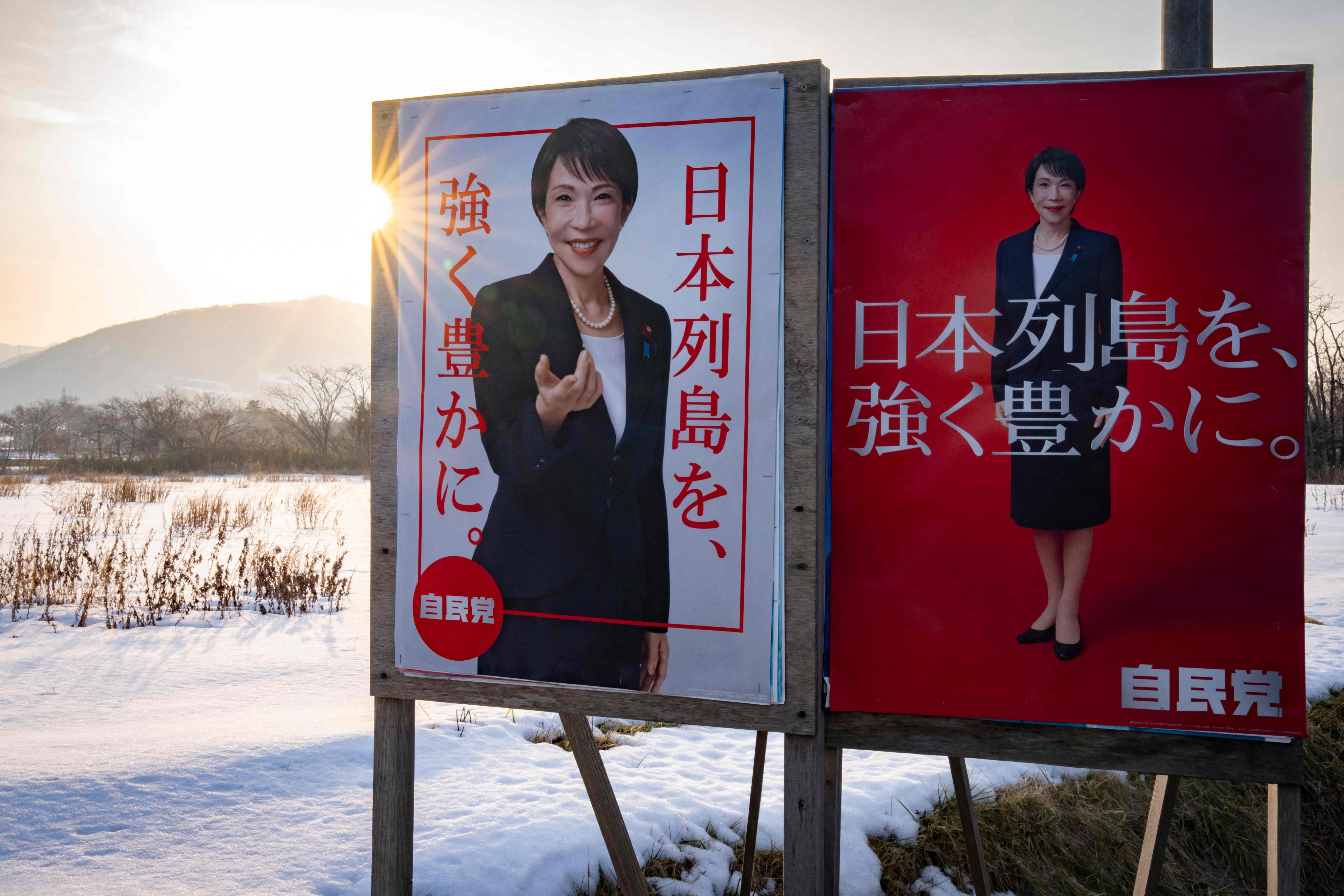 Japan’s Prime Minister Sanae Takaichi is seen on Liberal Democratic Party poster boards  in Date, Hokkaido prefecture, on Sunday. Photo: AFP