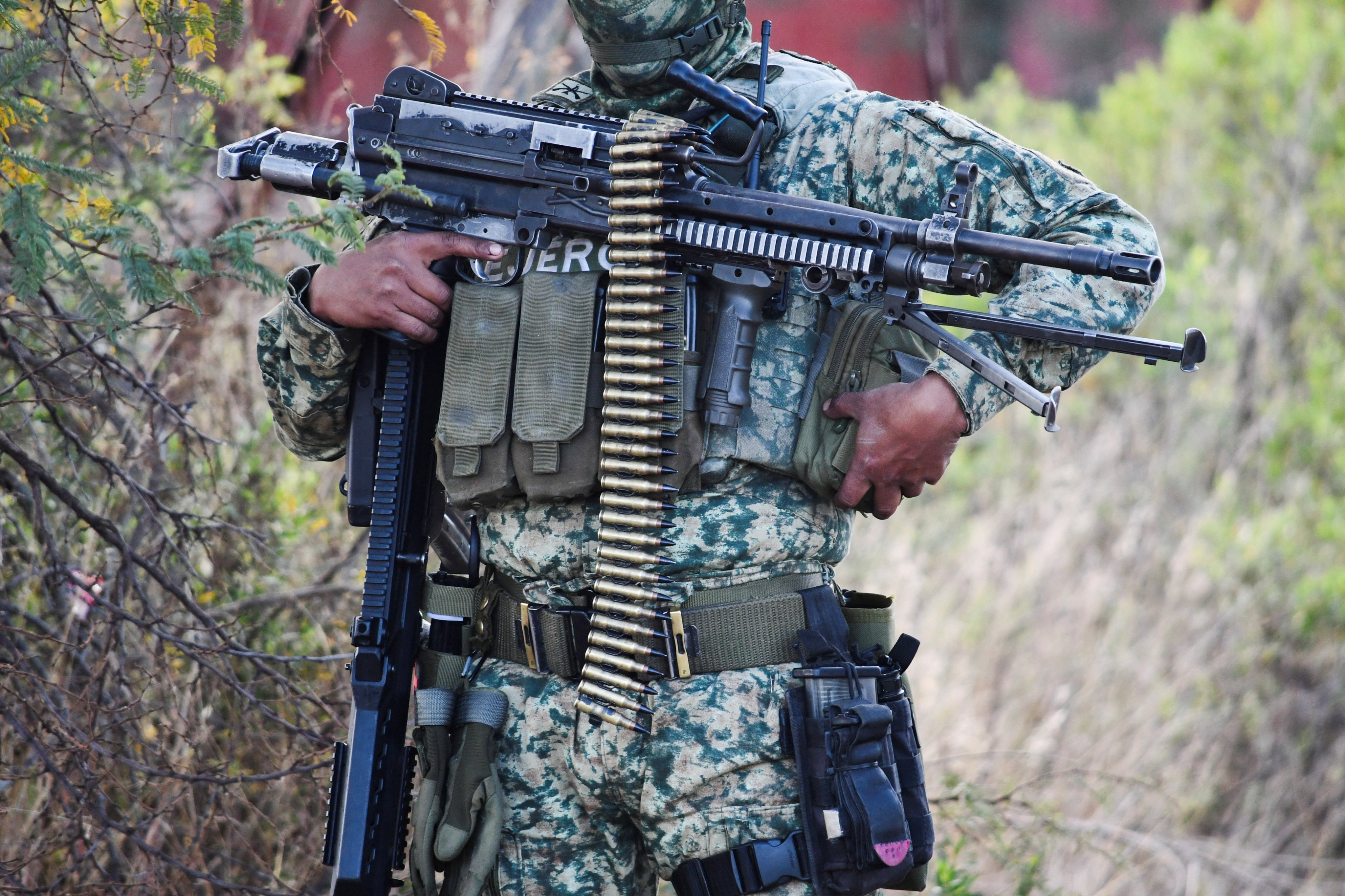 A soldier at a cordoned‑off area where federal forces carried out an operation targeting cartel boss Nemesio Oseguera Cervantes. Photo: Reuters