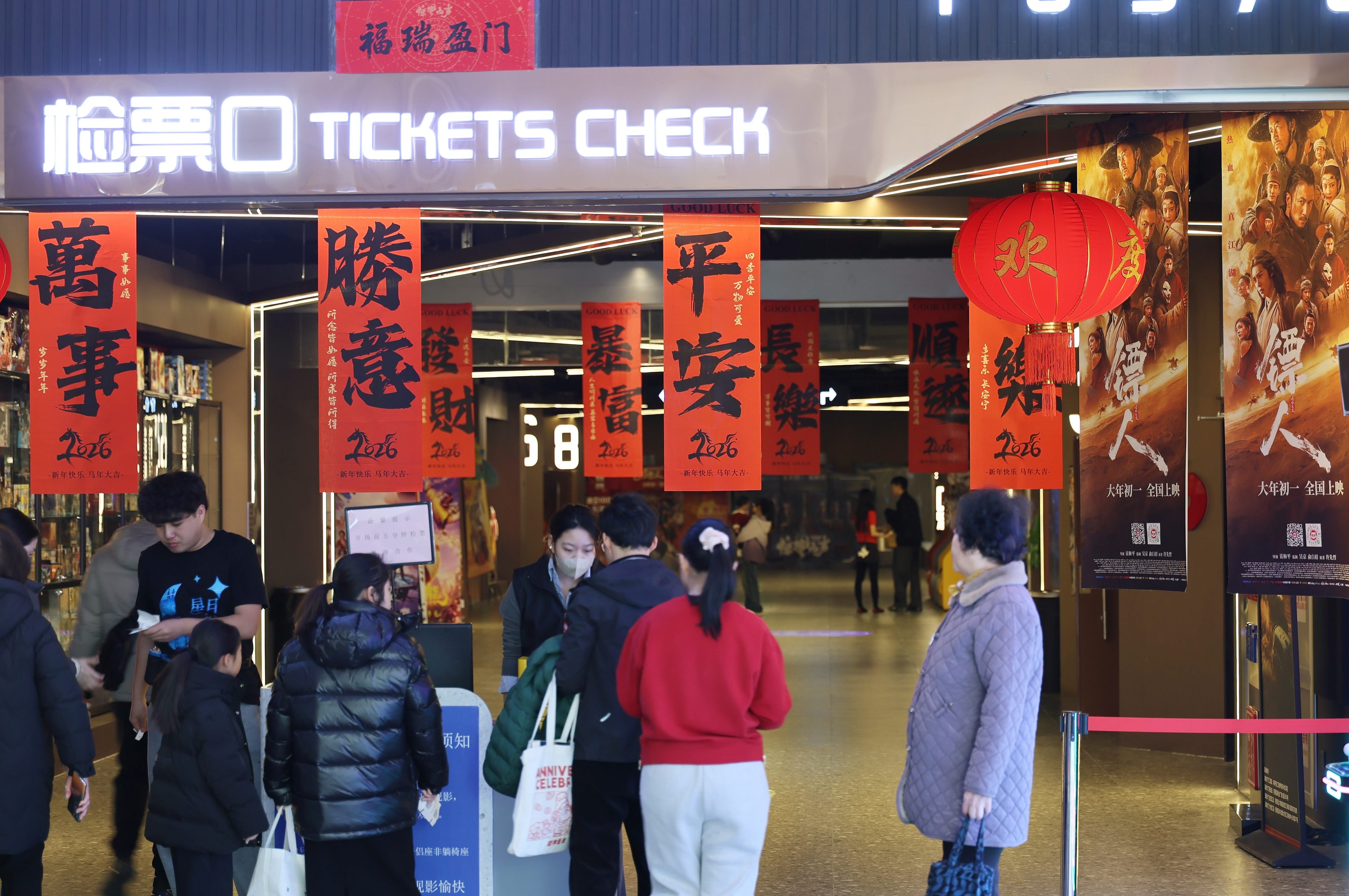 People line up to enter a cinema in north China’s Tianjin. Photo: Xinhua