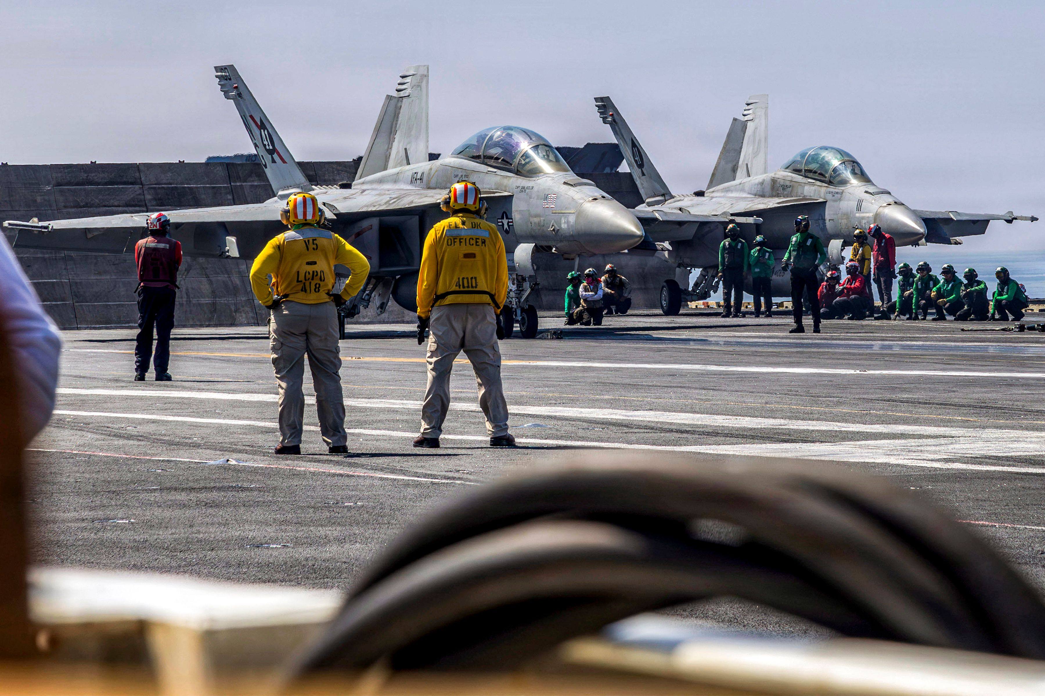 F/A-18F Super Hornets prepare to launch from the USS Abraham Lincoln in the Arabian Sea. Photo: US Navy via AFP