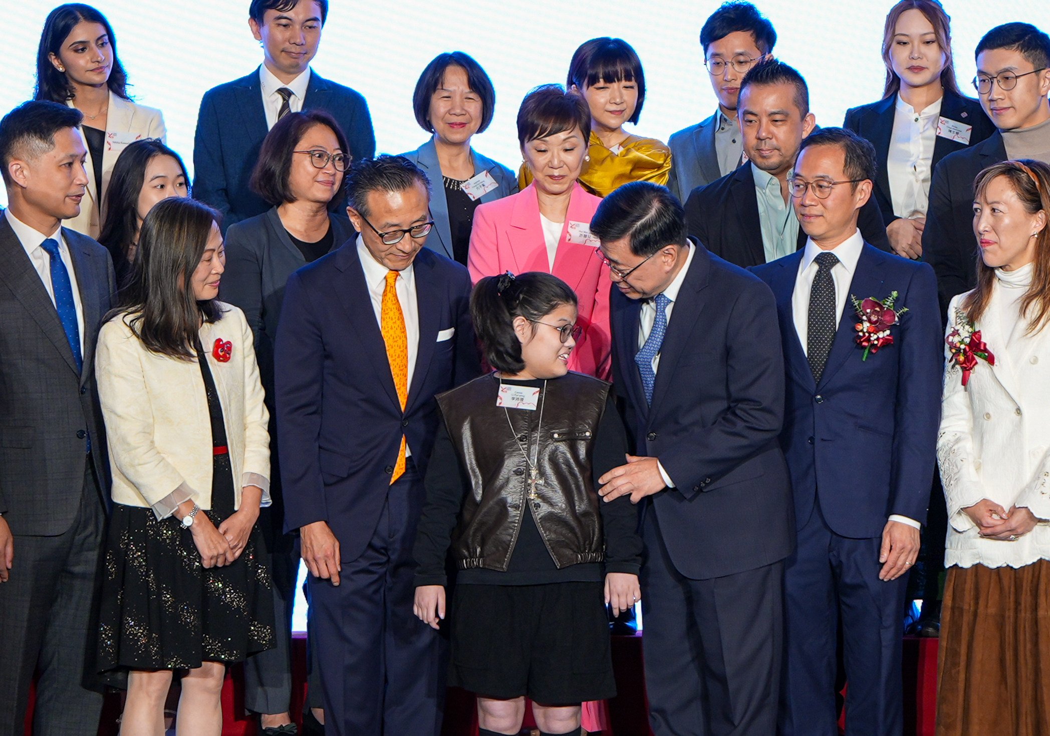 (Front row, from left) Fire services chief Andy Yeung, the SCMP’s Tammy Tam, Alibaba’s Joe Tsai, perseverance award finalist Cassie Li, Chief Executive John Lee, Ocean Park’s Paulo Pong and Sino Group’s Nikki Ng with other finalists and guests at the ceremony. Photo: Eugene Lee