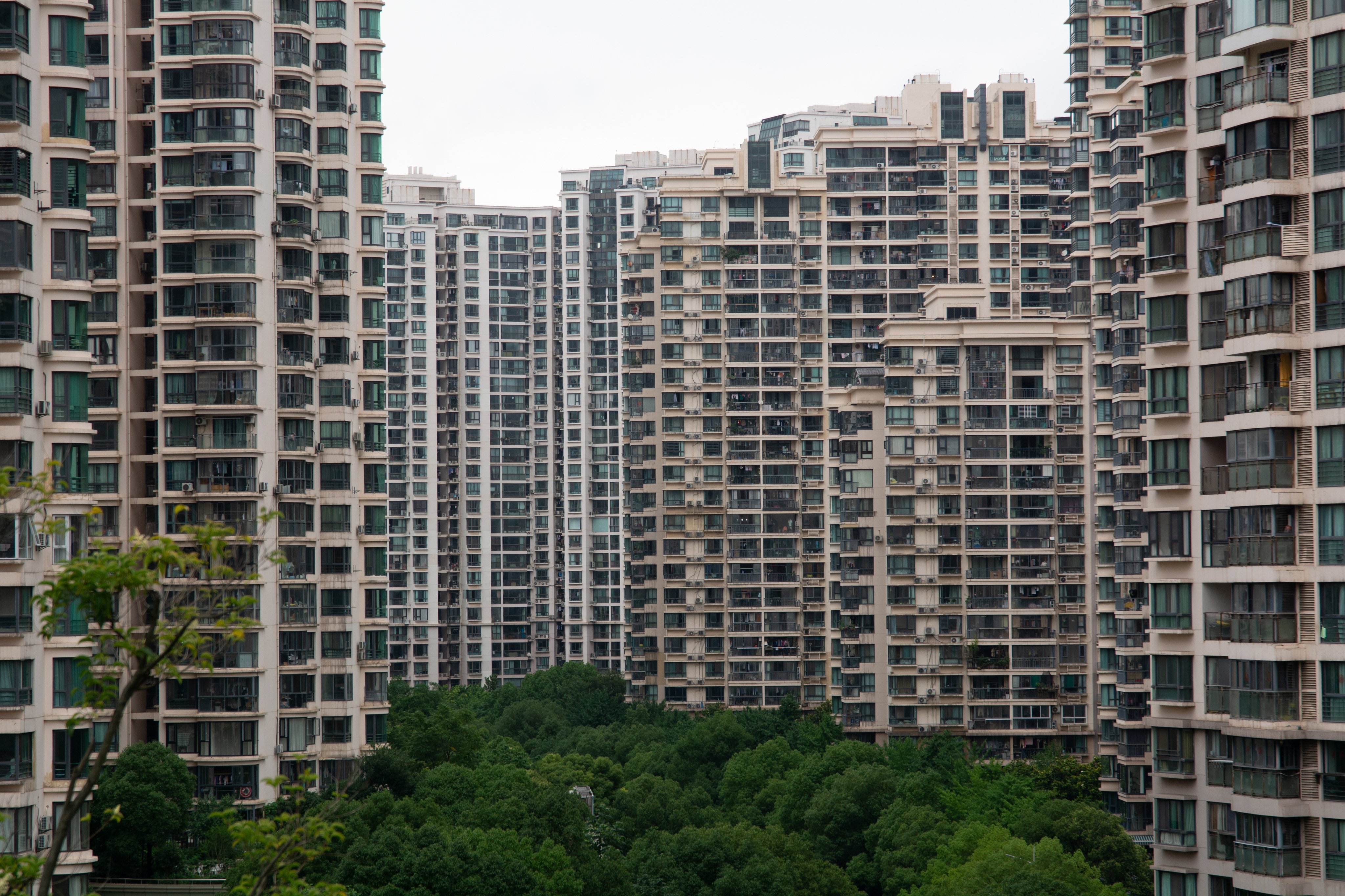 Residential buildings are seen along the Suzhou Creek in Shanghai, June 27, 2024. Photo: NurPhoto via Getty Images