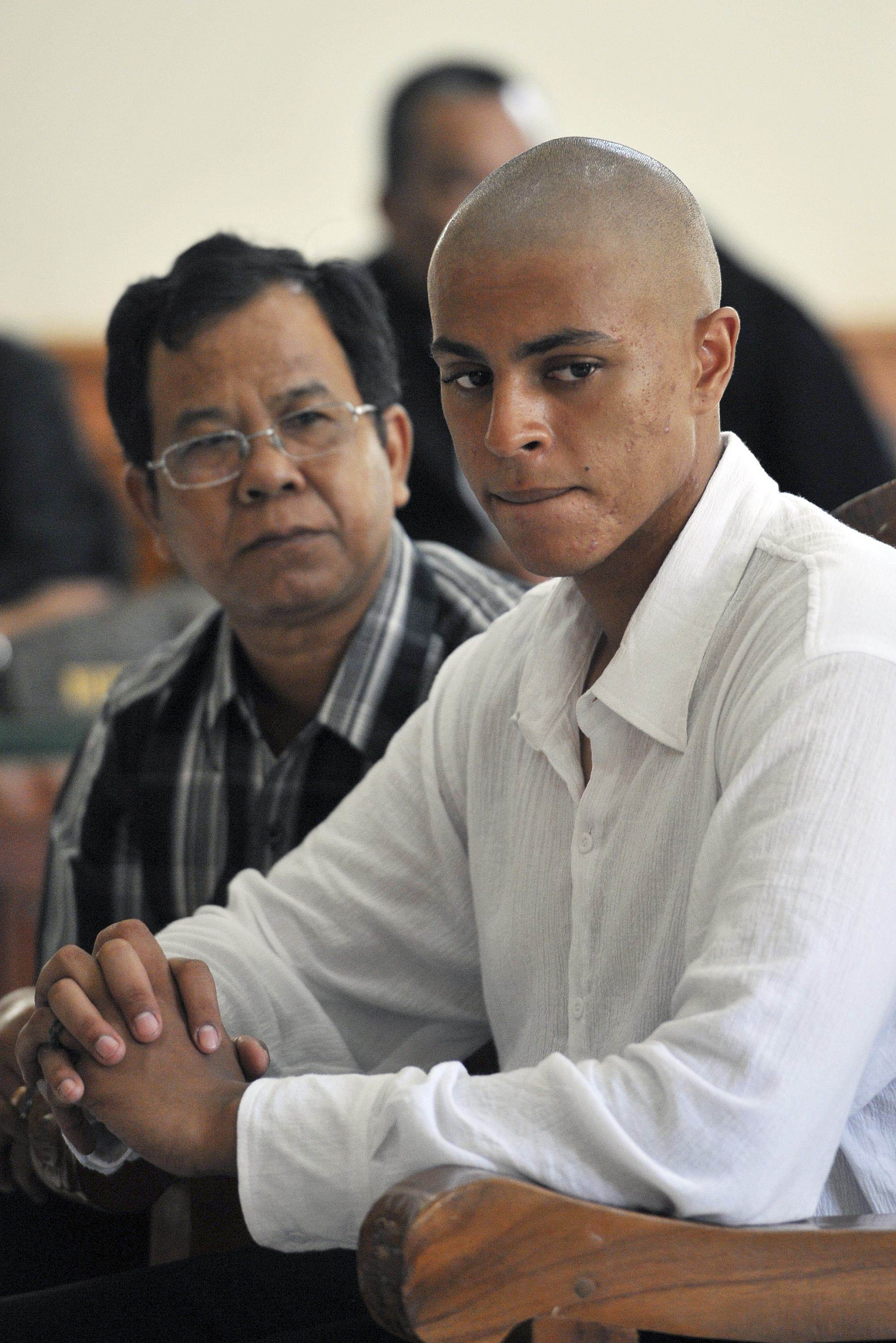 Tommy Schaefer sits next to an interpreter during his trial in Denpasar on January 14, 2015. Photo: Antara/Reuters
