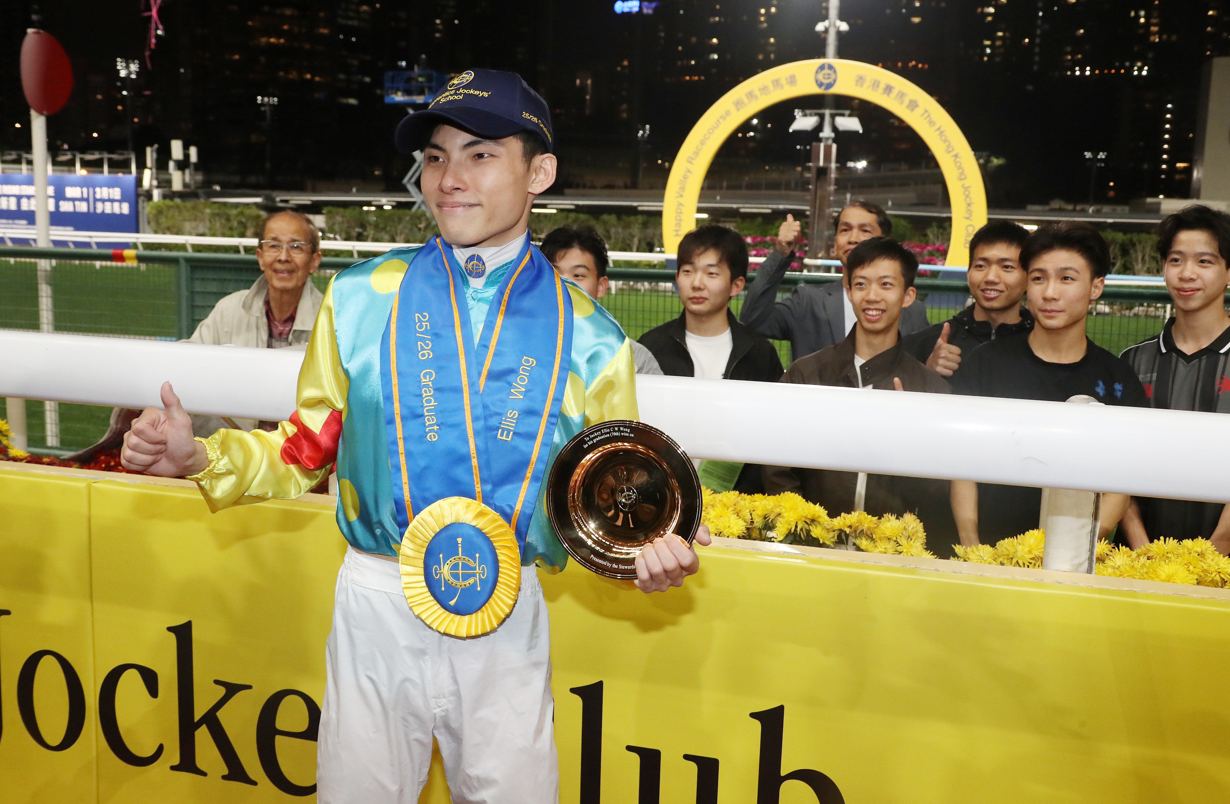 Ellis Wong celebrates graduating from his apprenticeship at Happy Valley. Photos: Kenneth Chan