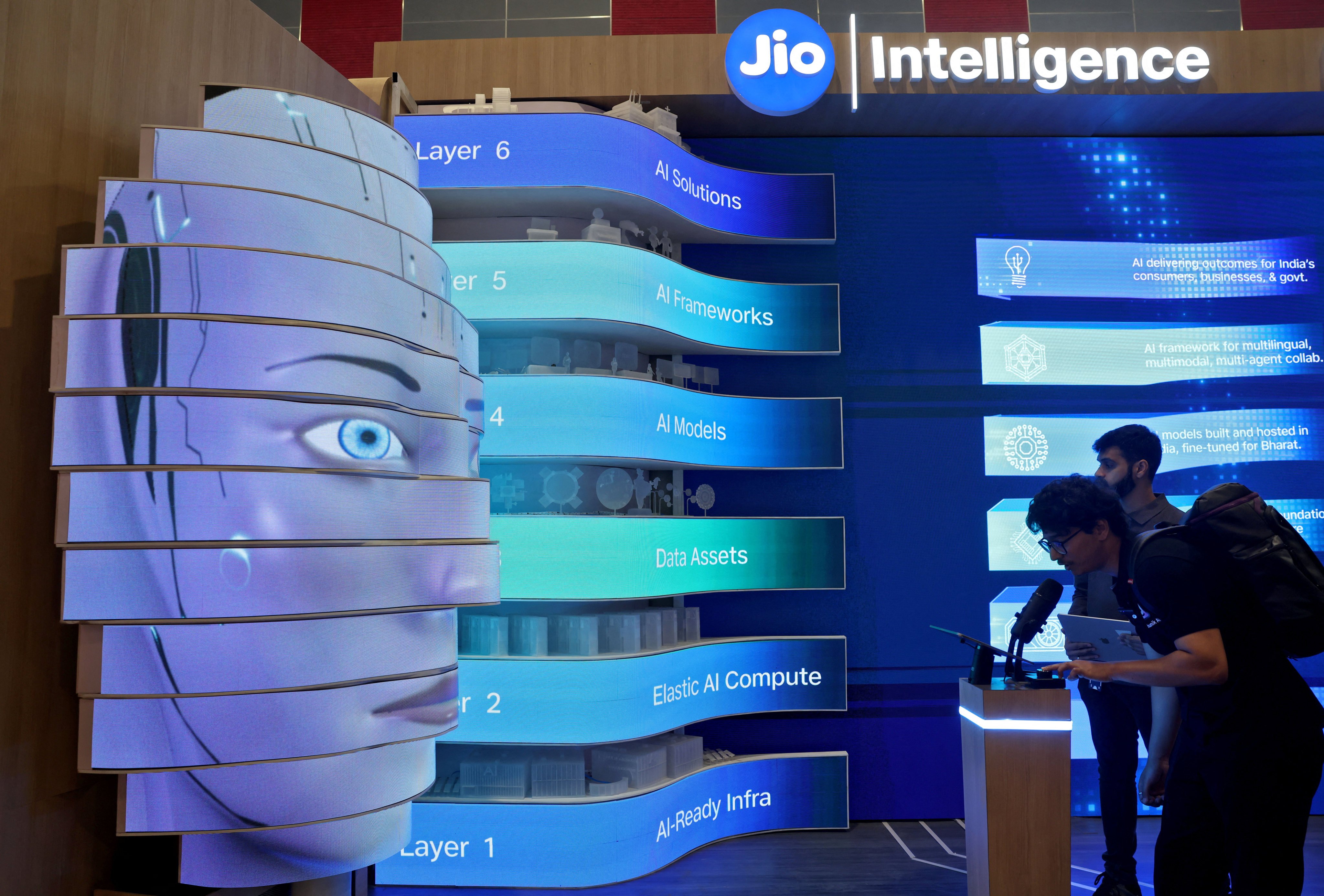 A visitor checks a Jio intelligence bot on display at Bharat Mandapam, one of the venues for the AI Impact Summit in New Delhi, India, on February 17. Photo: Reuters