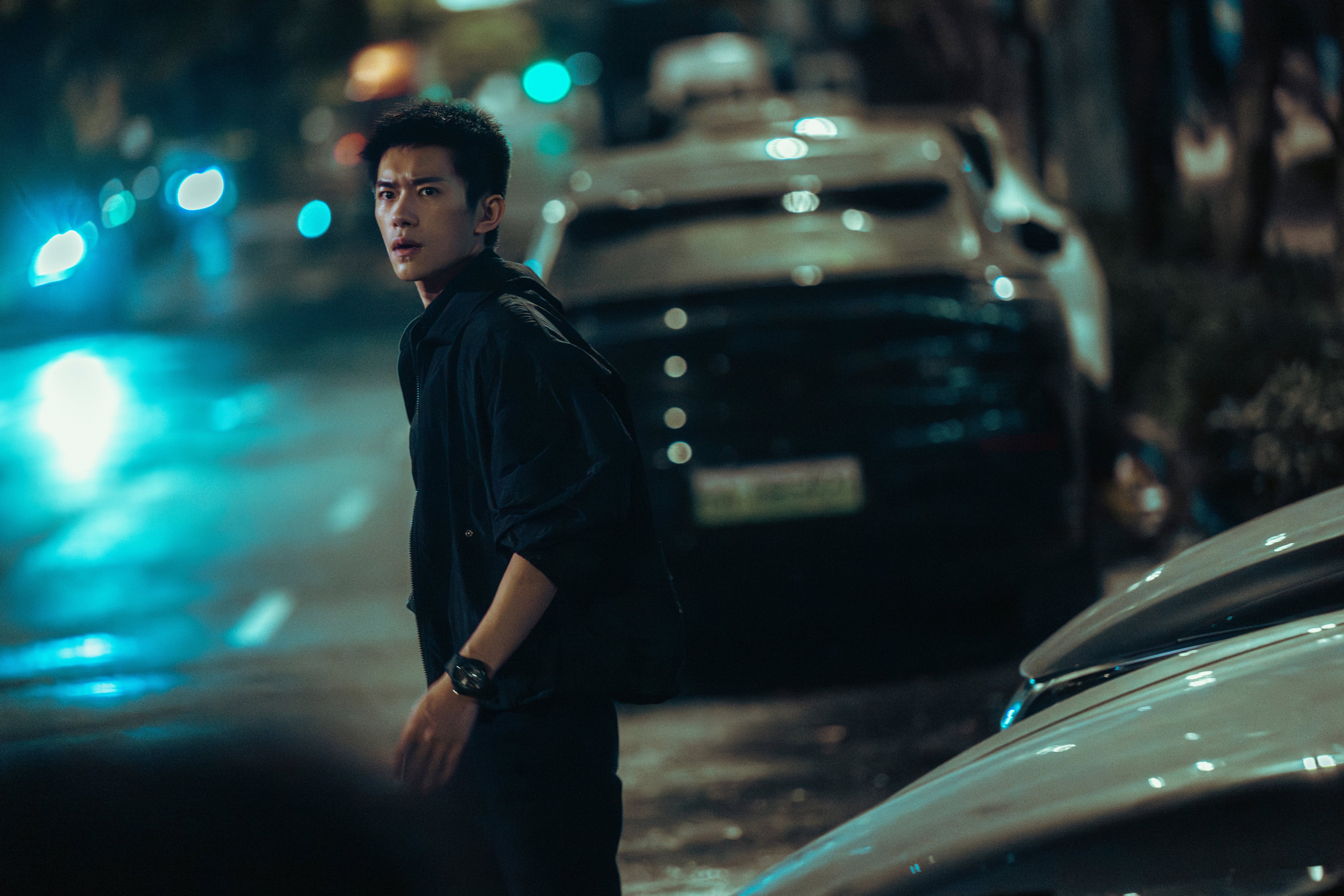 Jackson Yee as security operative Yan Di in a still from Scare Out (category IIB, Mandarin), directed by Zhang Yimou. Zhu Yilong and Song Jia co-star.