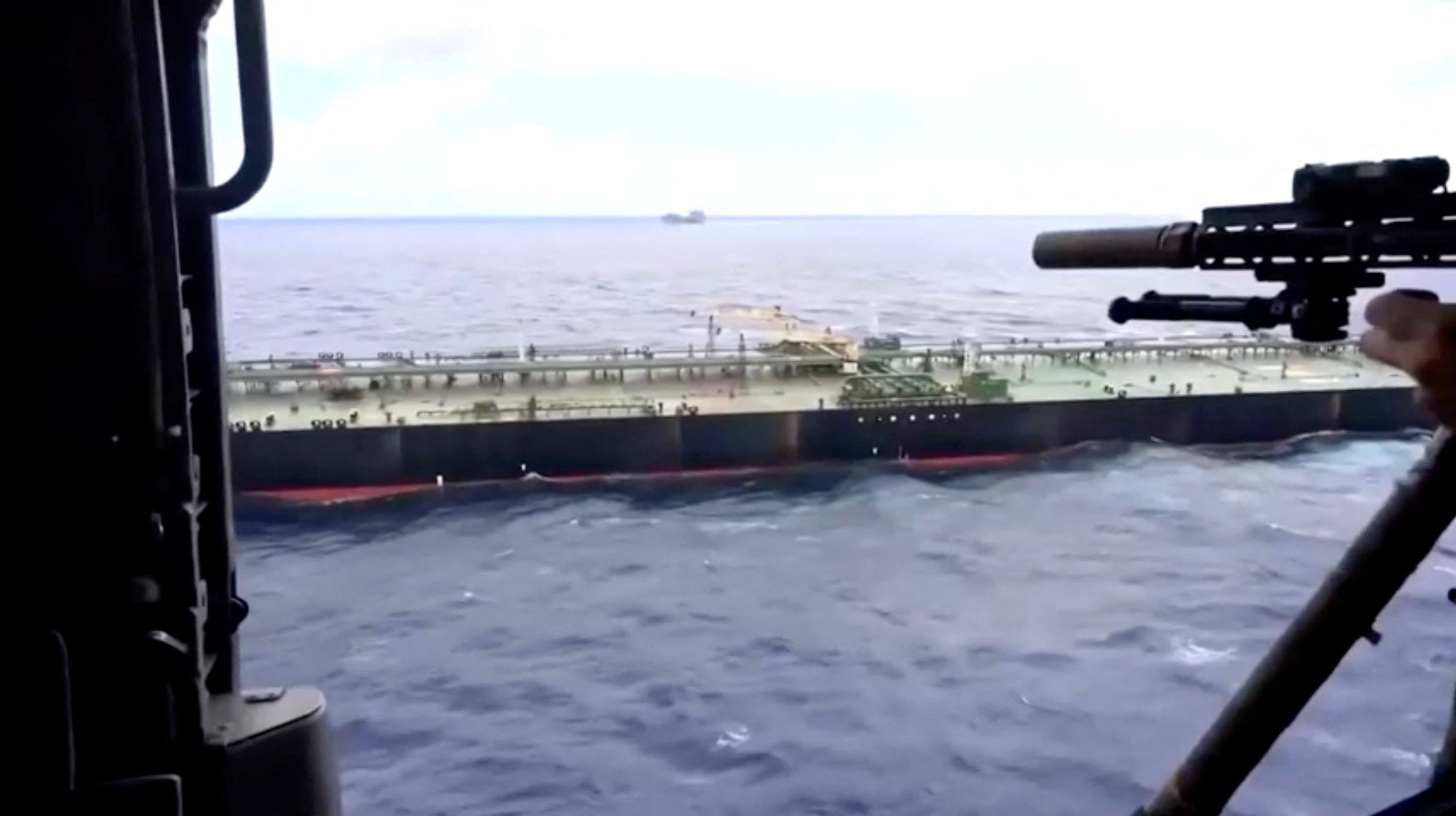 An oil tanker is seized by US forces, the Pentagon says, in footage released on Tuesday. Photo: US Department of Defence via Reuters