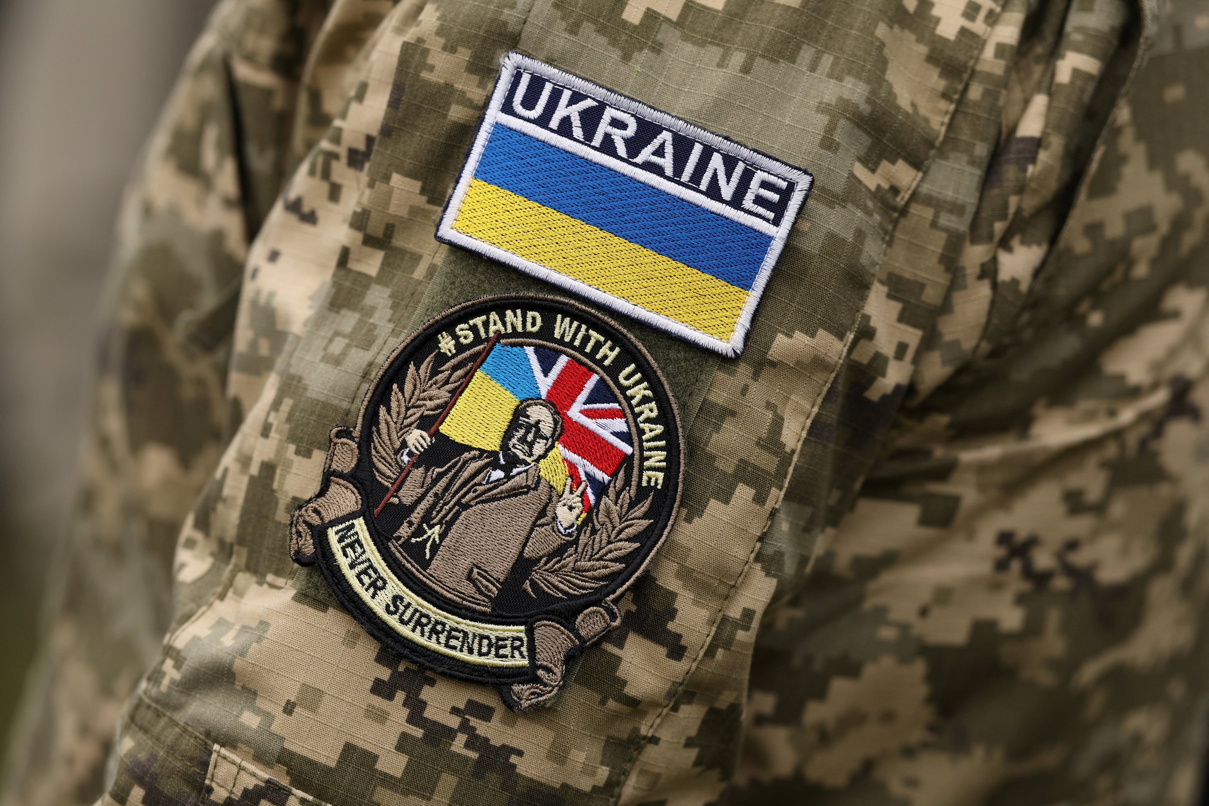 Ukrainian soldiers and partner forces attend a commemoration service marking the fourth anniversary of Russia’s full-scale invasion of Ukraine at a British Army training camp in East Anglia, Britain, on Tuesday. Photo: Reuters