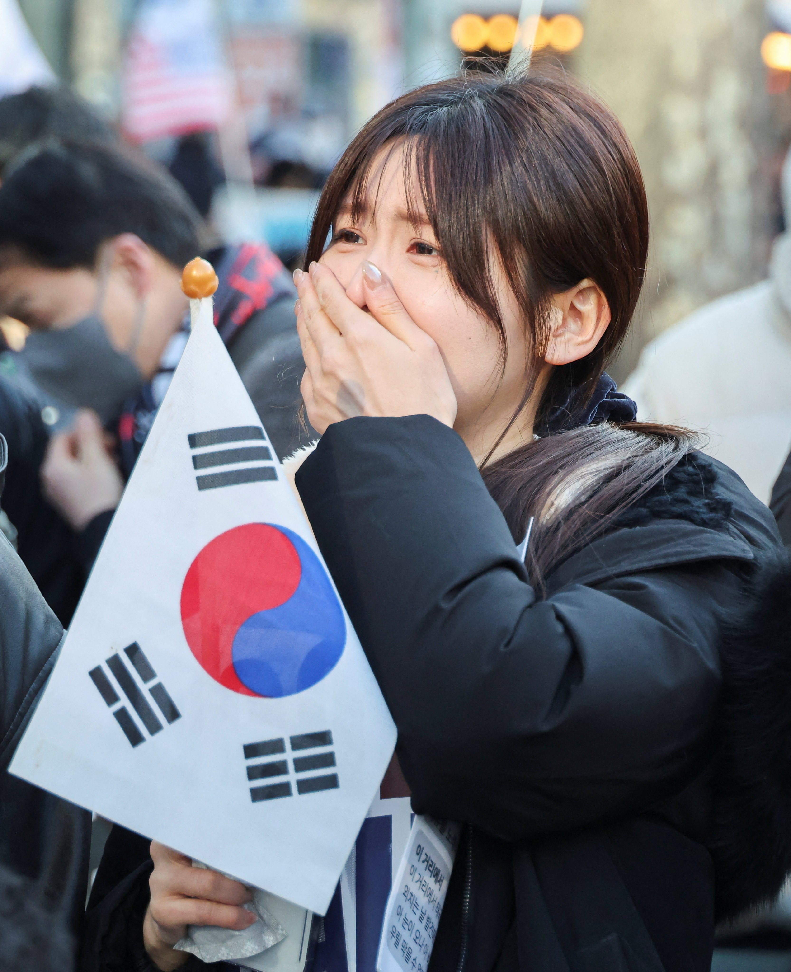 A supporter of former South Korean president Yoon Suk-yeol reacts following a guilty verdict during the sentencing trial in his insurrection case on February 19. Photo: Reuters