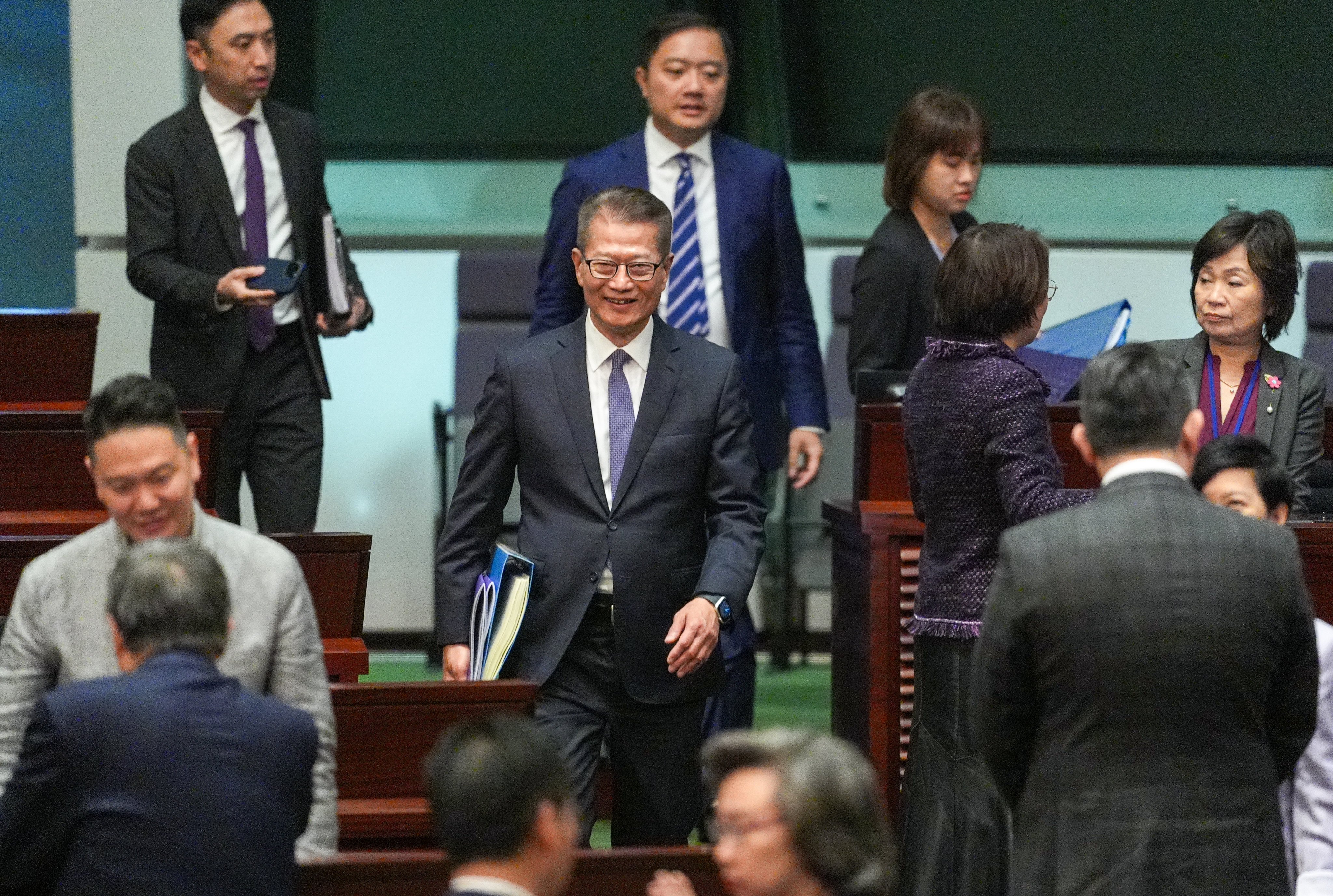 Financial Secretary Paul Chan delivers his budget at Legislative Council in Admiralty. Photo: Eugene Lee