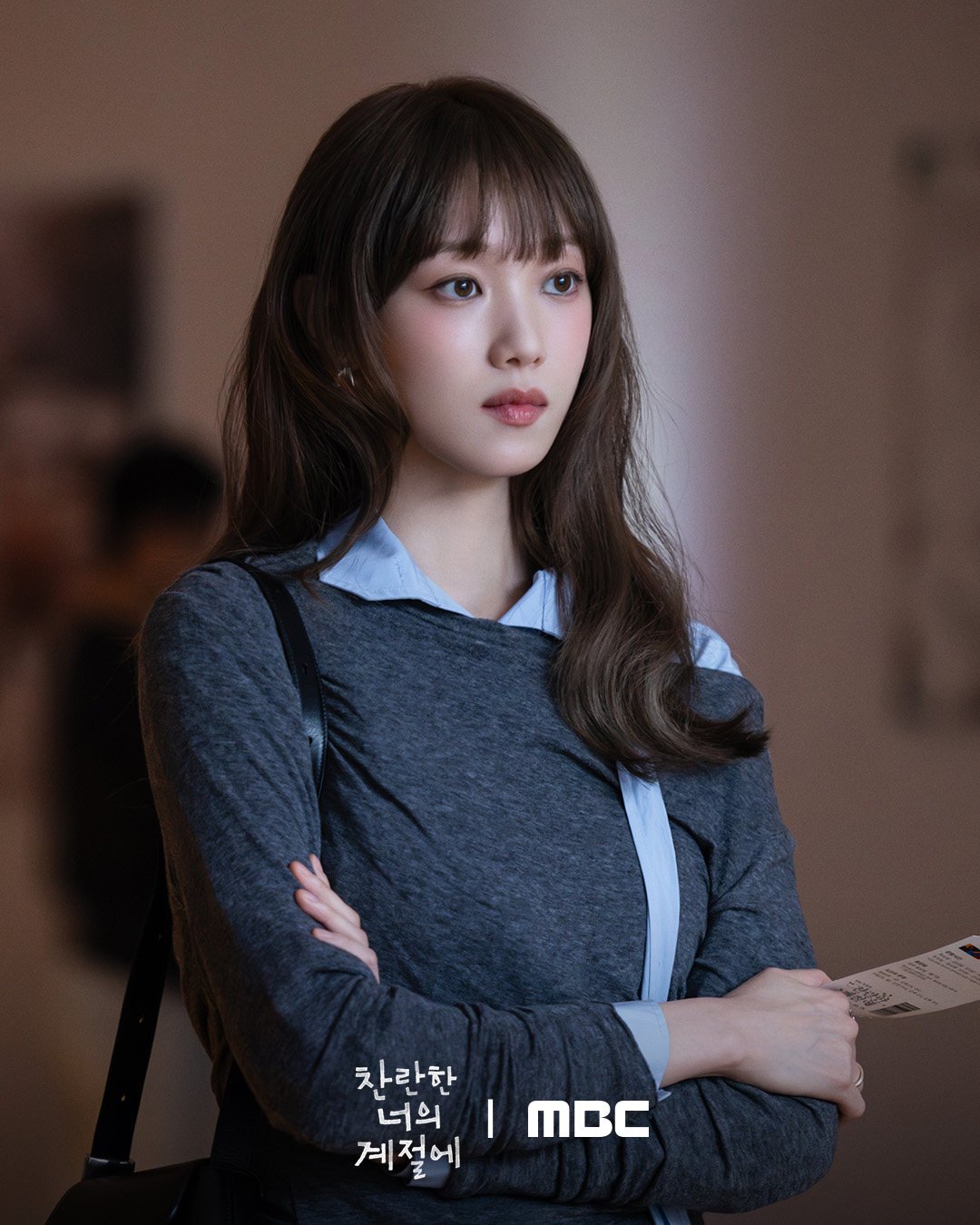 Lee Sung-kyung as designer Song Ha-ran in a still from In Your Radiant Season.