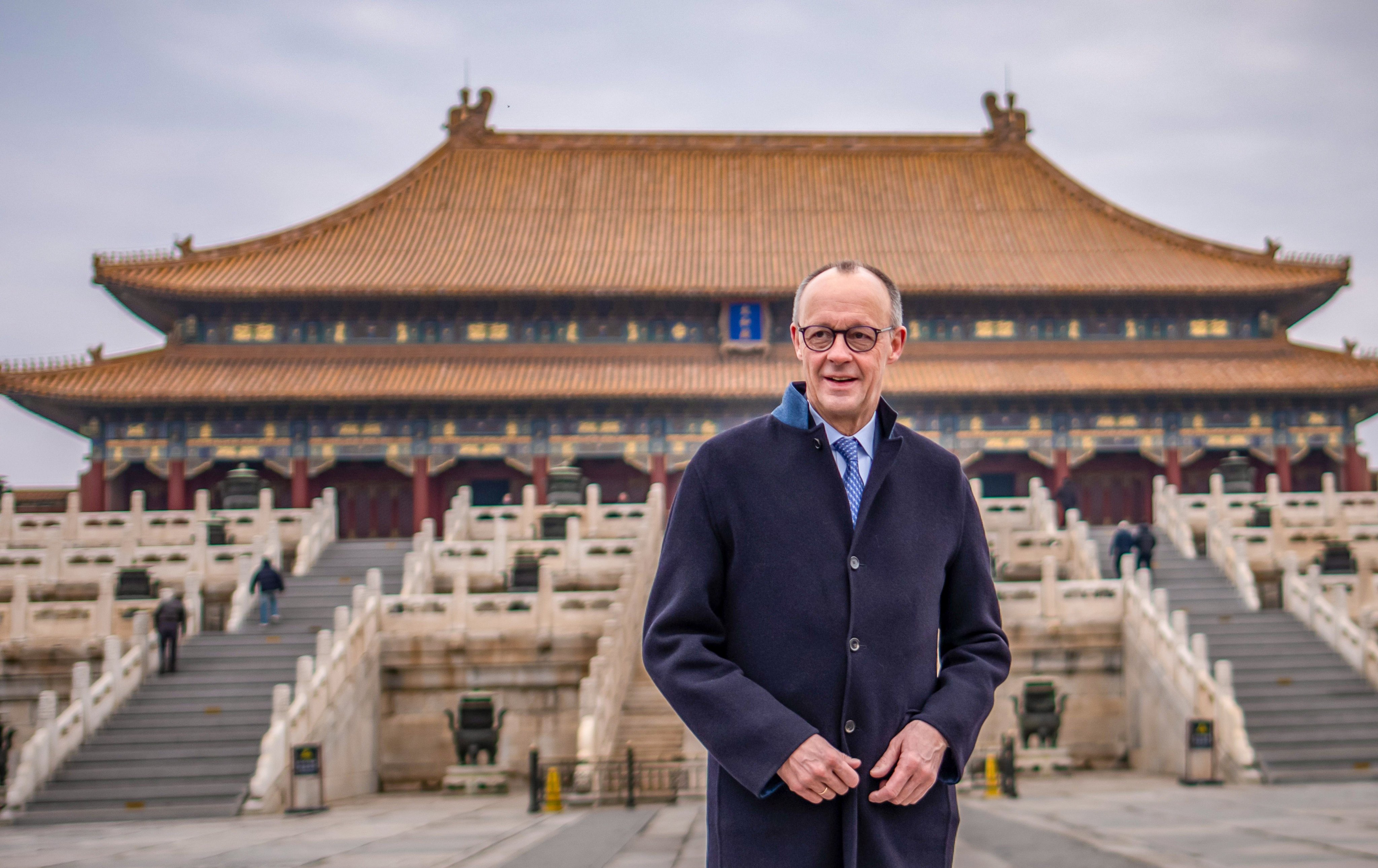 German Chancellor Friedrich Merz (centre) visits the Forbidden City in Beijing on Thursday. Photo: Michael Kappeler/dpa