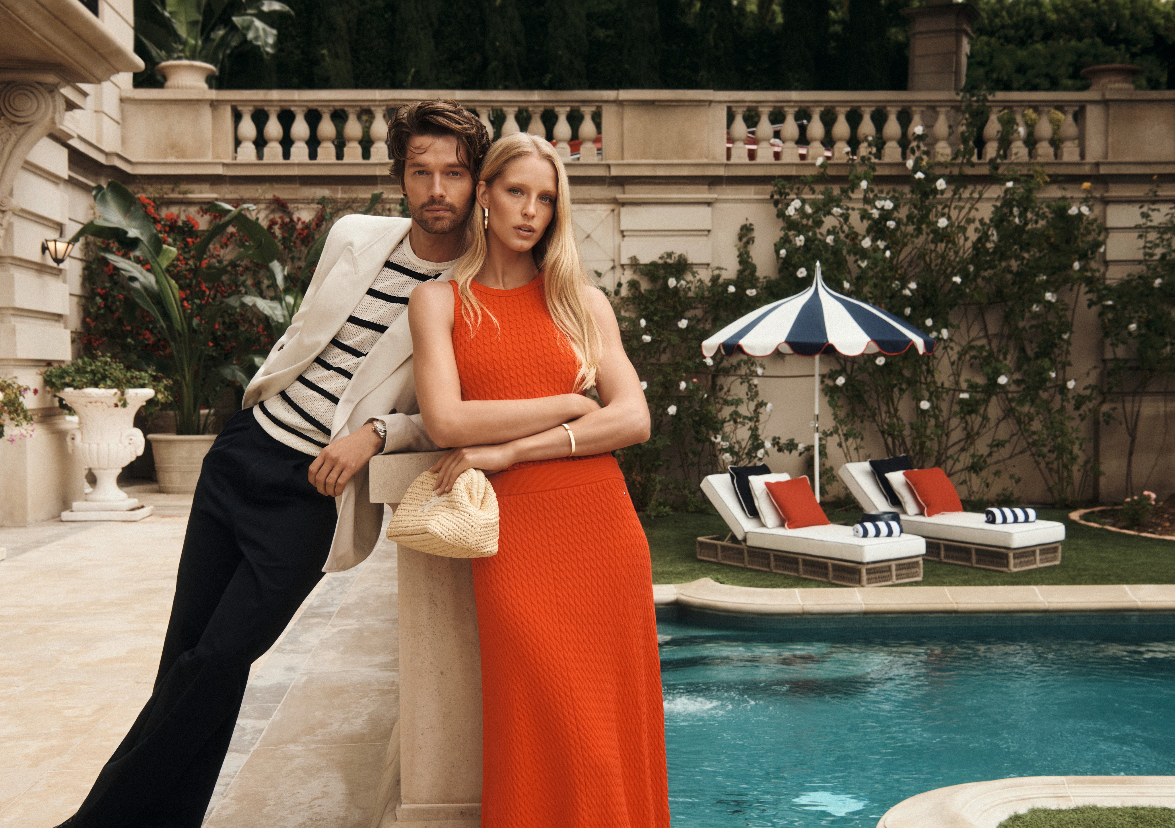 Abby Champion and Patrick Schwarzenegger model the quintessentially preppy Tommy Hilfiger spring 2026 collection by the pool. Photo: Handout, Outfits: Tommy Hilfiger