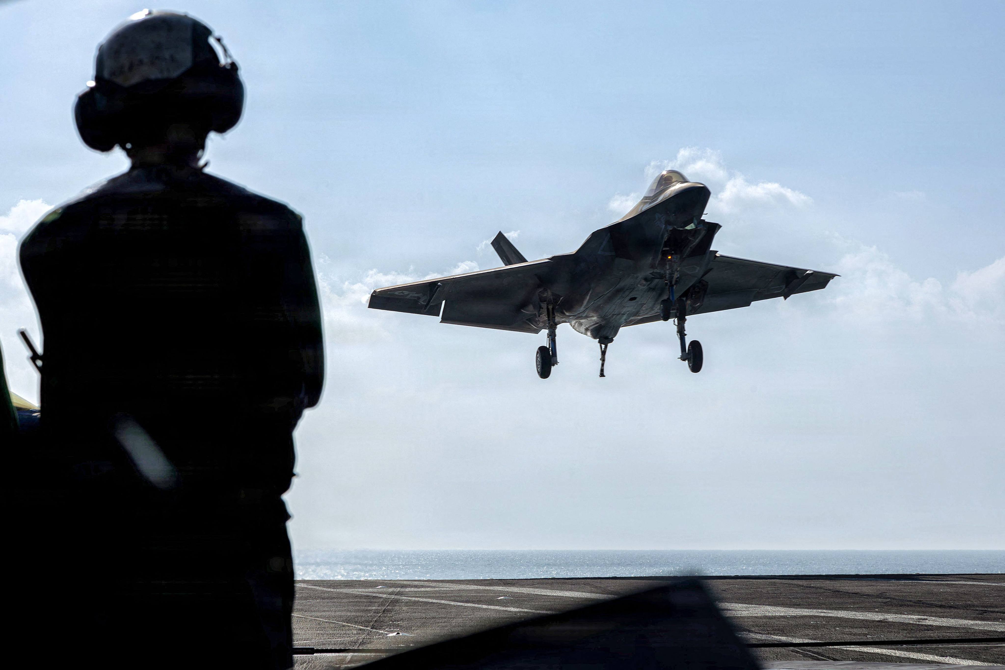 A US Air Force F-35C Lightning II lands on the flight deck of the USS Abraham Lincoln in the Arabian Sea on February 12. Photo: AFP