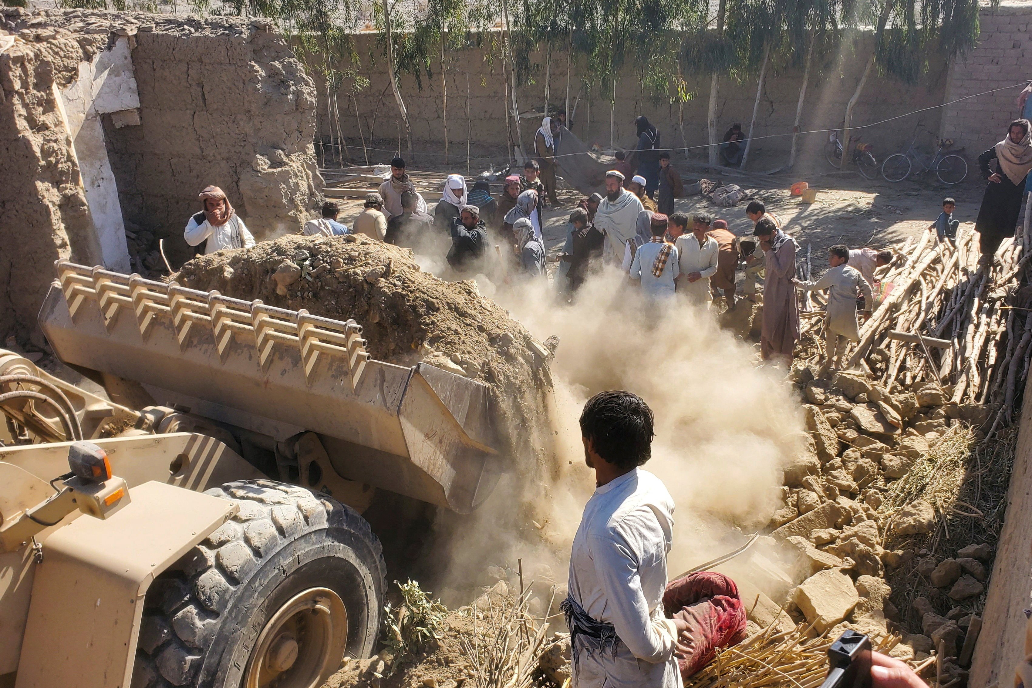 Machinery clears the debris of a damaged house after Pakistani air strikes in Nangarhar, Afghanistan, on Sunday. Photo: Reuters