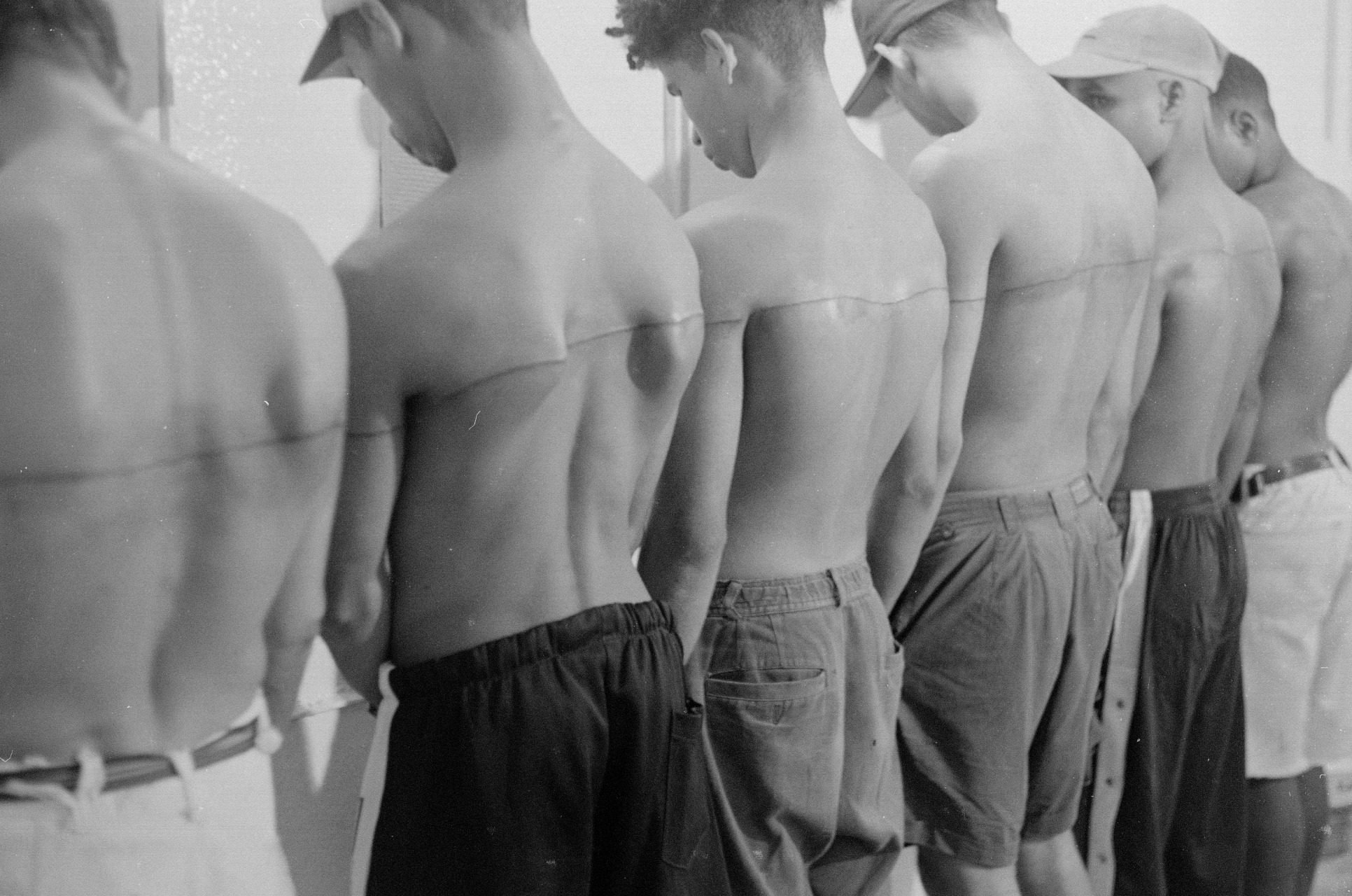 Santiago Sierra’s “250 cm Line Tattooed on 6 Paid People” (1999) is featured in Gold’s opening exhibition. Photo: Estudio Santiago Sierra