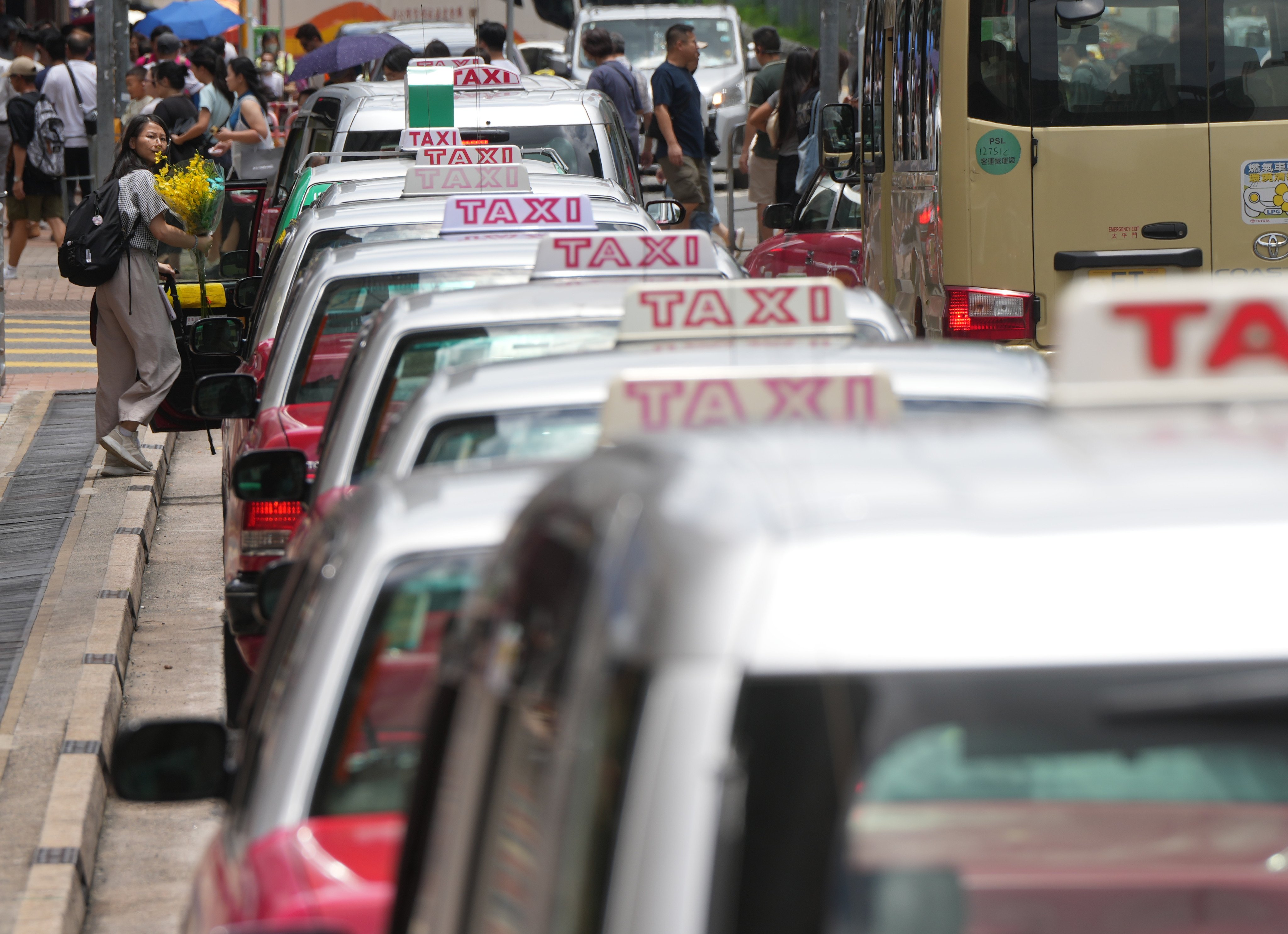 Taxis and buses outside Tai Wai MTR station on July 14, 2024. Photo: Sam Tsang