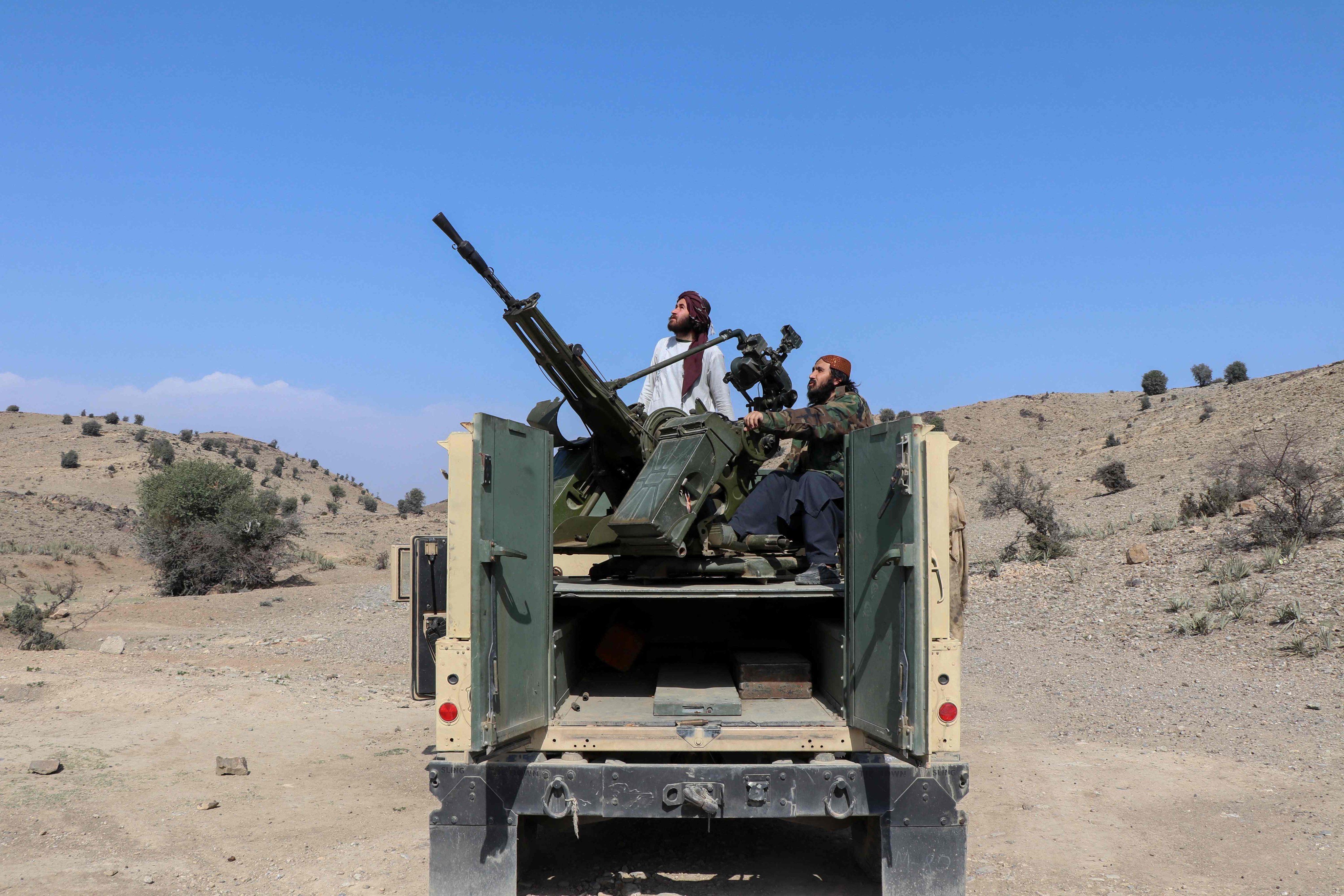 Taliban security personnel keep watch for airstrikes in Khost province, Afghanistan on Friday following overnight cross-border fighting with Pakistan. Photo: AFP