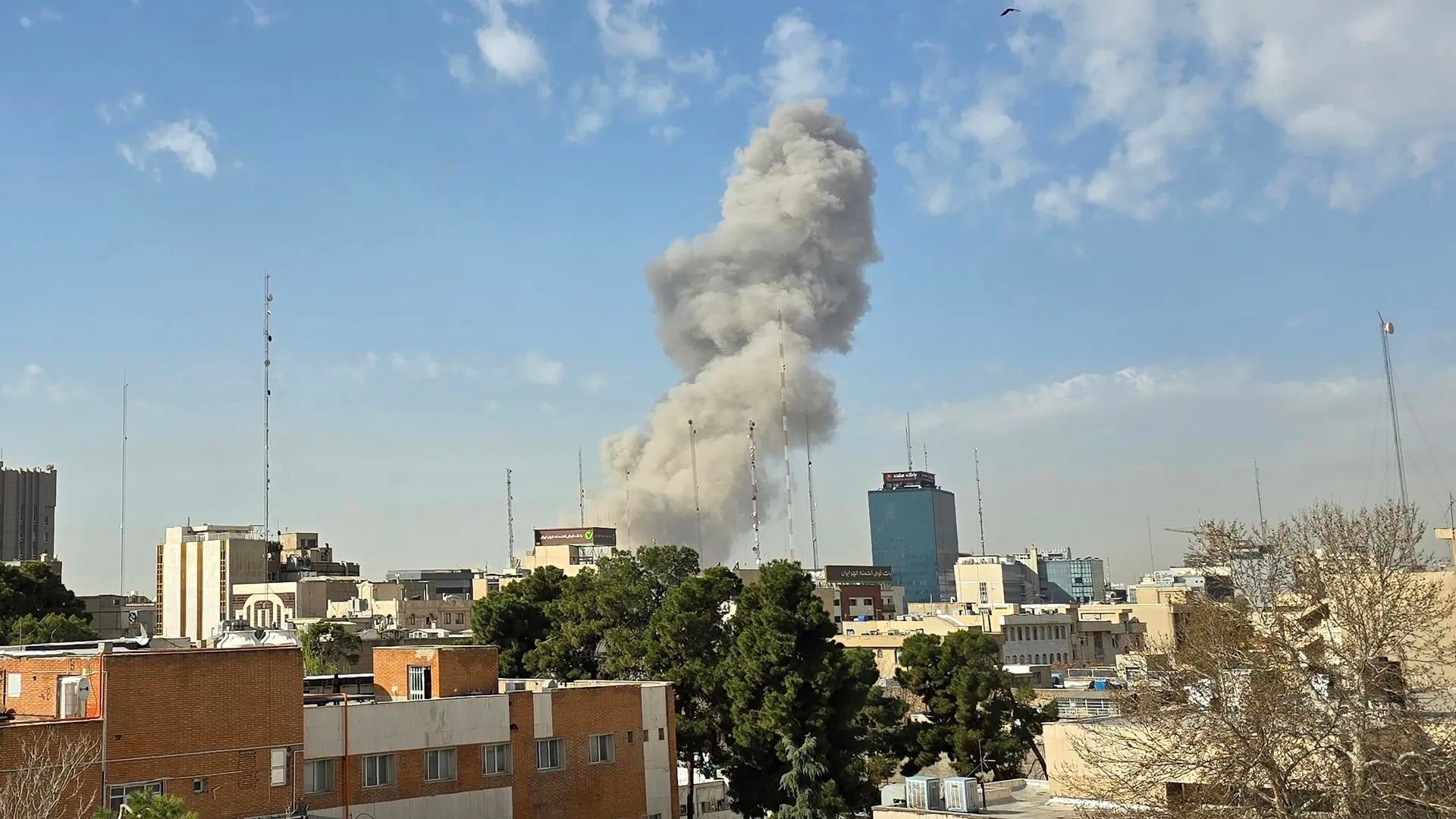 A plume of smoke rises following an explosion in Tehran on Saturday. Photo: Getty Images