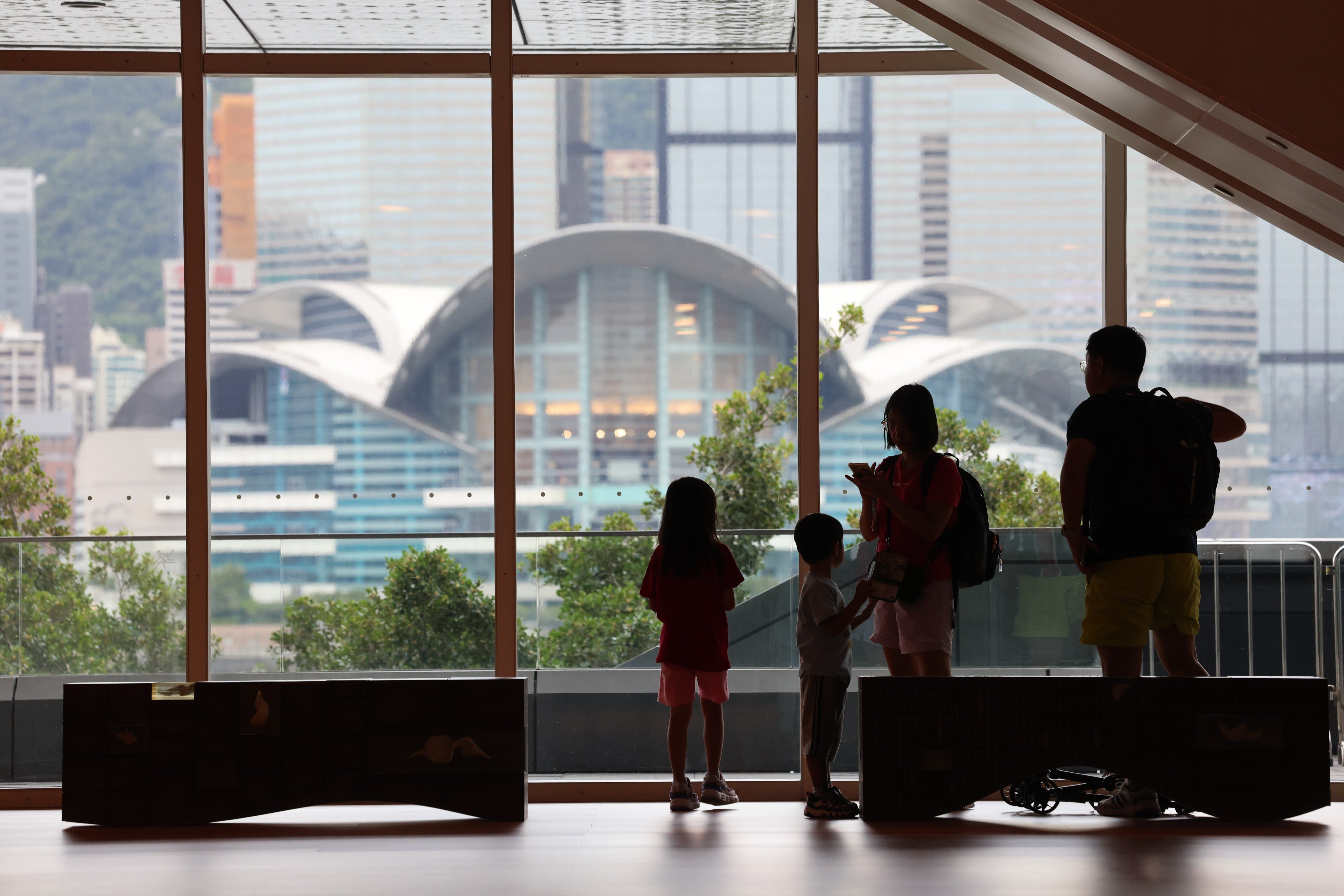 A family take a rest in the Hong Kong Museum of Art in Tsim Sha Tsui on September 19, 2025. The number of babies born in Hong Kong dropped last year after rising for two years. Photo: Jelly Tse