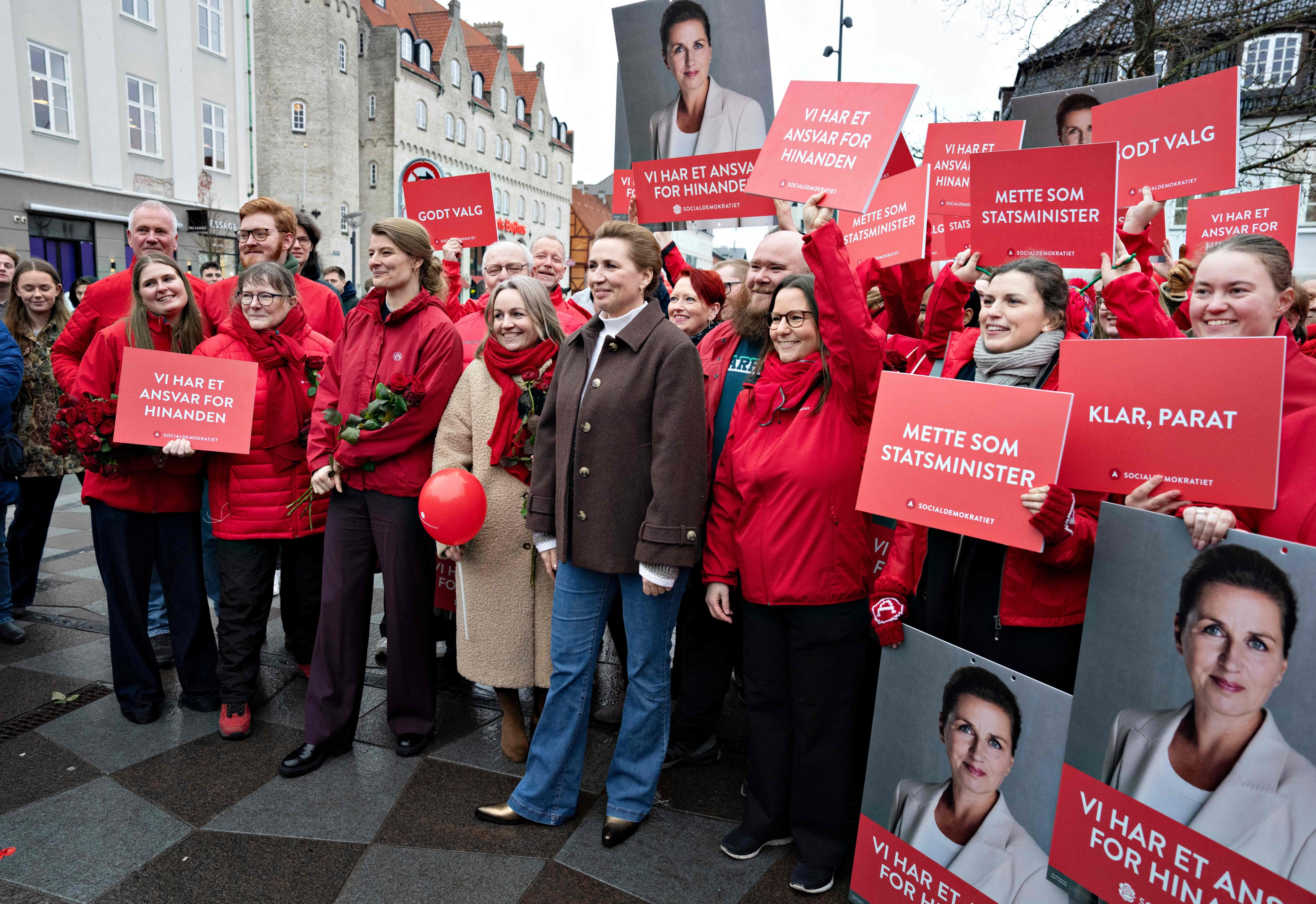 Denmark’s Prime Minister Mette Frederiksen (centre) campaigns at Nytorv in Aalborg on Friday ahead of the country’s March 24 general election. Photo: AFP