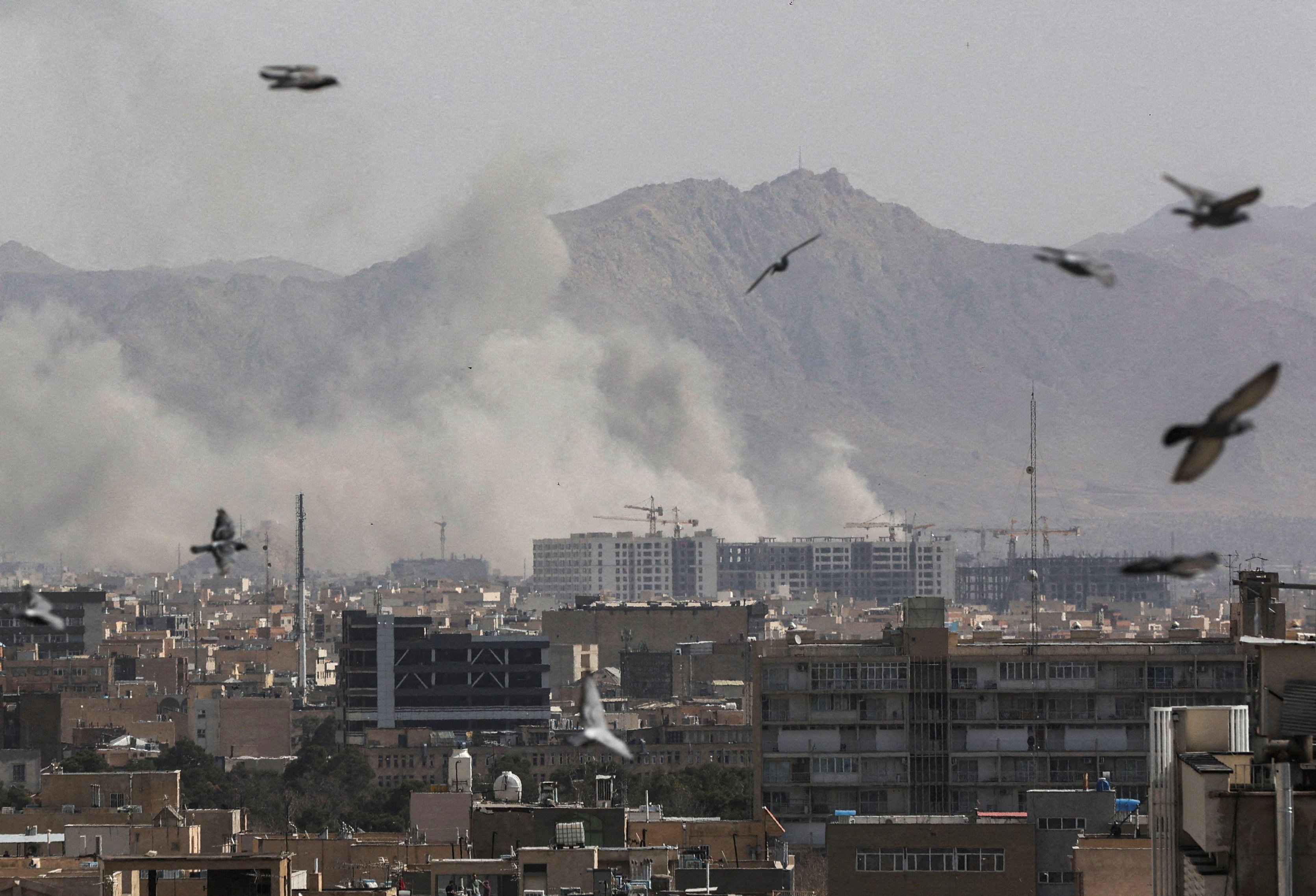 Smoke rises in the Iranian capital Tehran following Israeli and US strikes on Saturday. Photo: WANA via Reuters