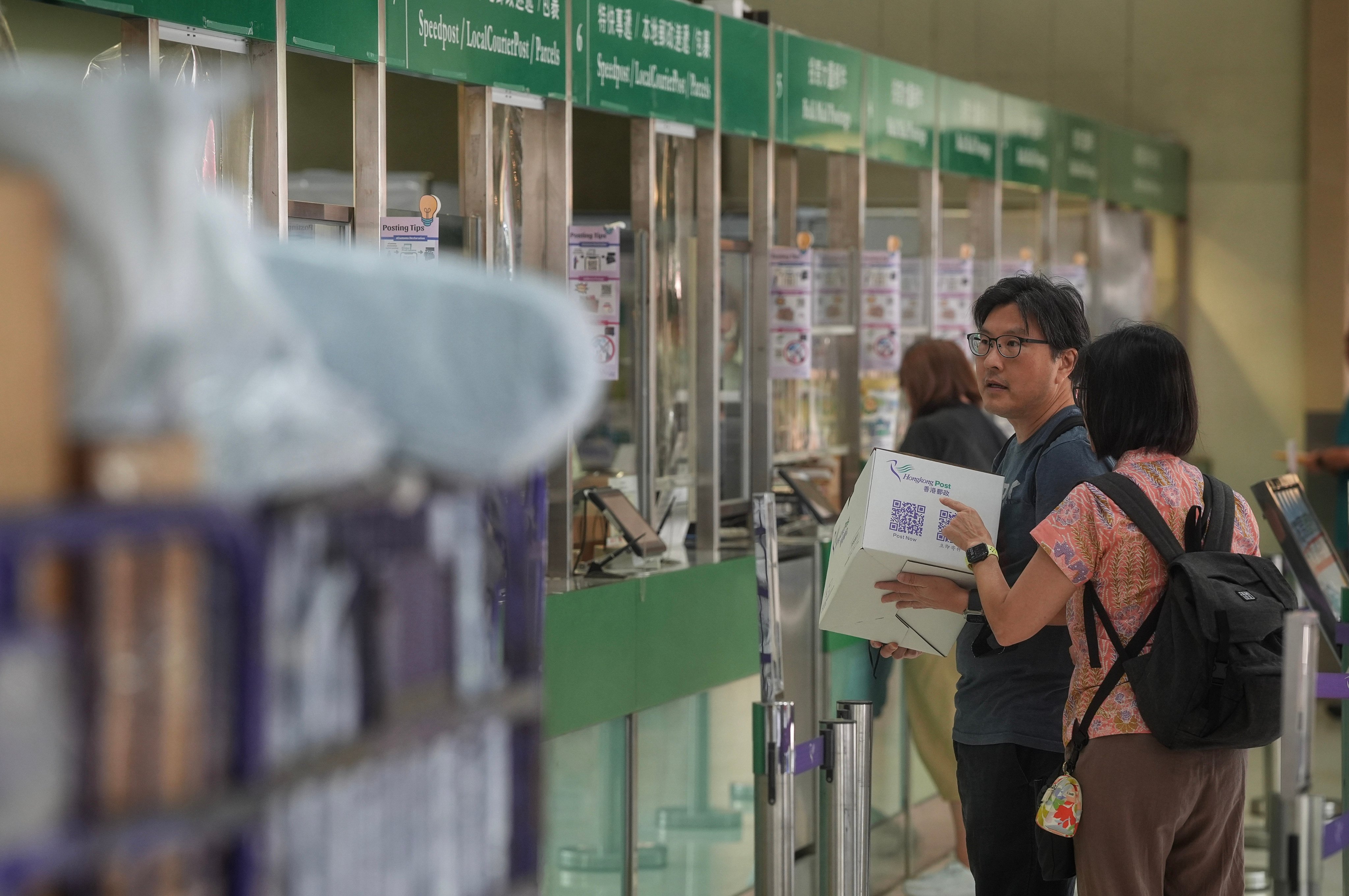 Residents mail parcels at the General Post Office in Central in May 2025. Photo: Elson Li