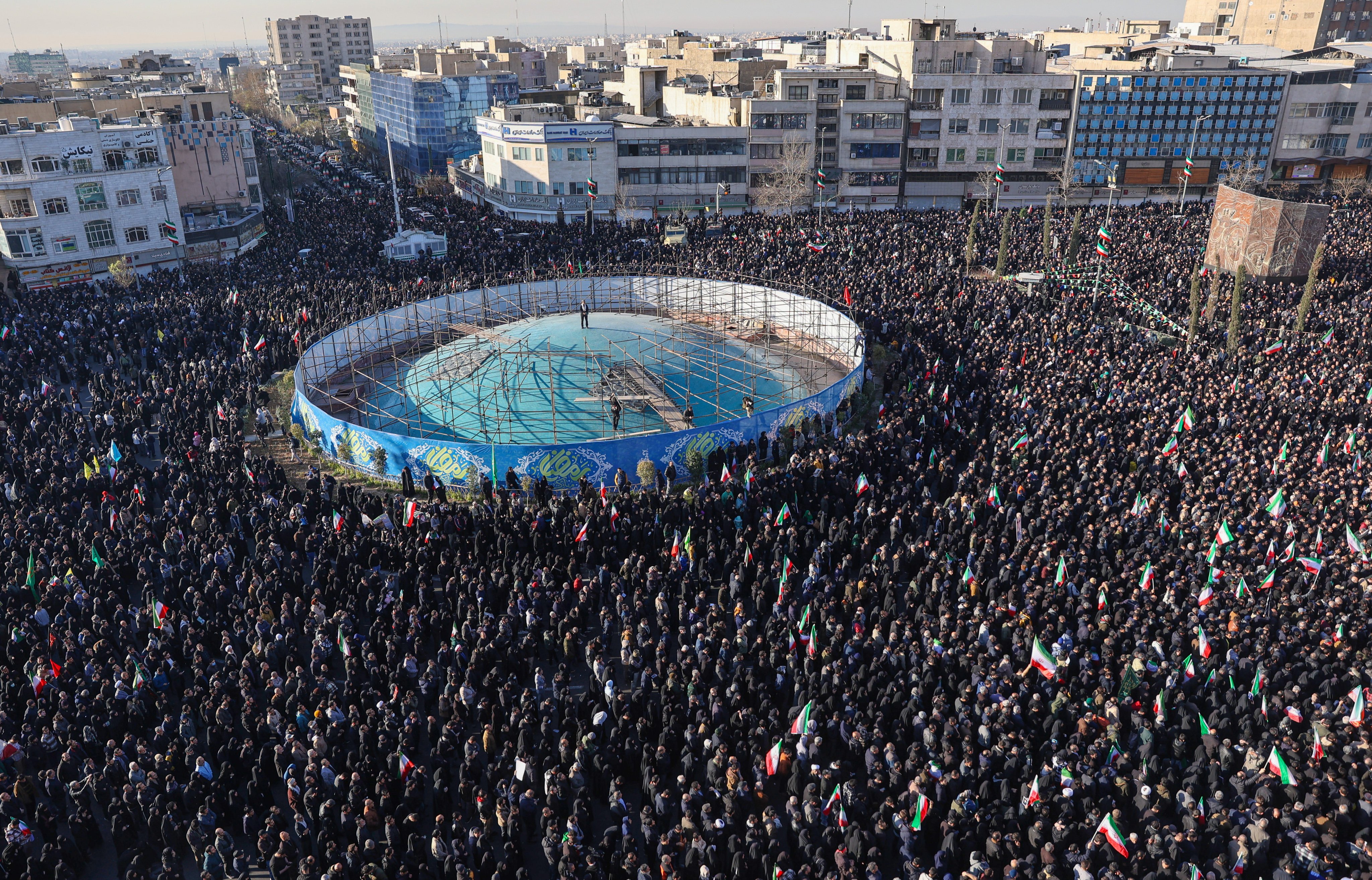 Government supporters gather in mourning after state TV officially announces the death of Iranian supreme leader Ayatollah Ali Khamenei, in Tehran, Iran on Sunday. Photo: AP
