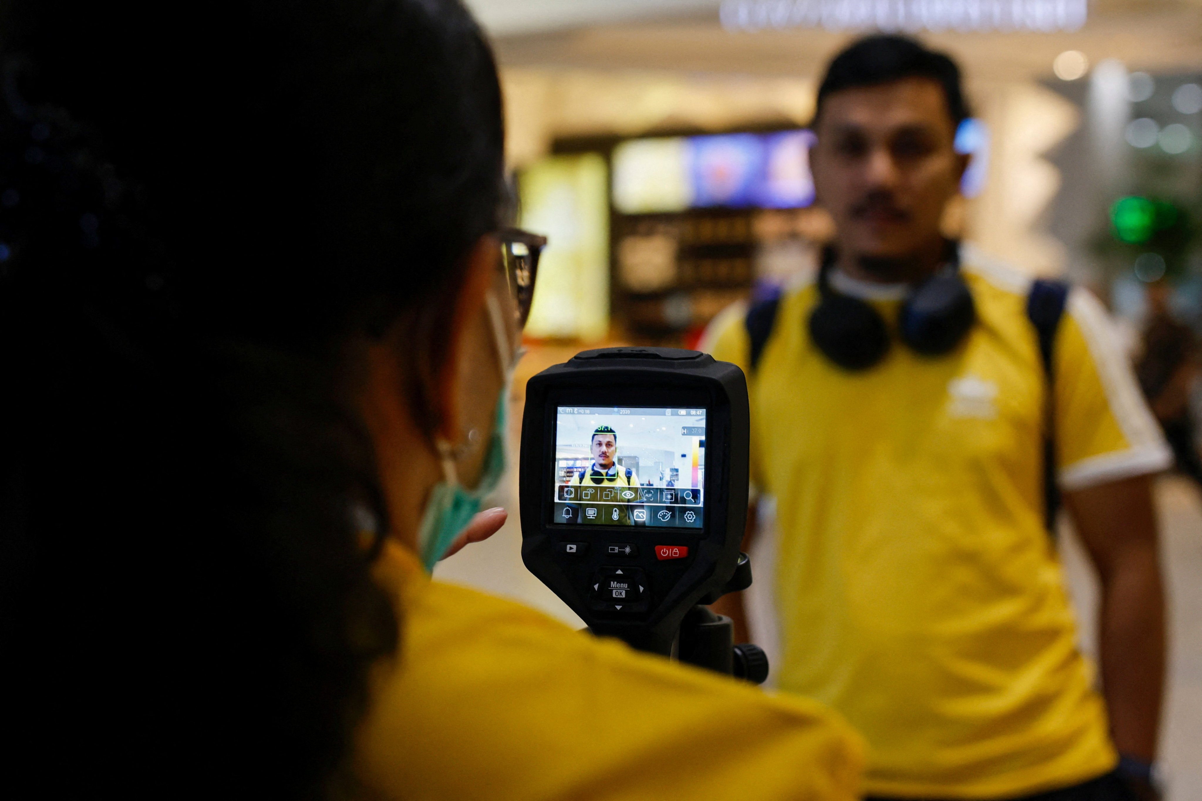 A passenger is checked with a thermal imager at Indonesia’s Soekarno Hatta International Airport, after India confirmed two cases of the deadly Nipah virus, in Tangerang near Jakarta, Indonesia, on January 30. Photo: Reuters