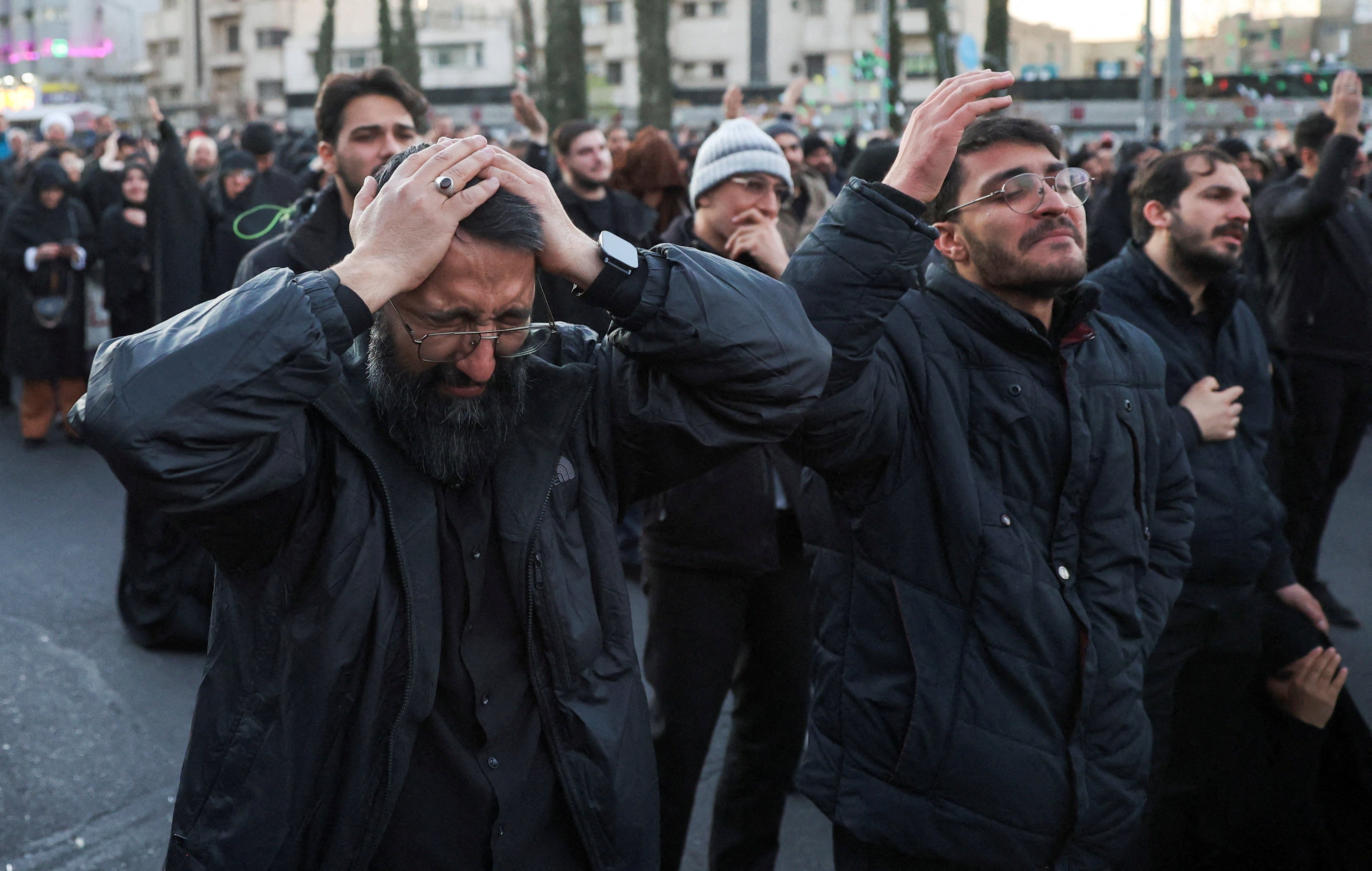 People gather at Tehran’s Enghelab Square after Iran’s Supreme leader Ali Khamenei was killed. Photo: West Asia News Agency via Reuters