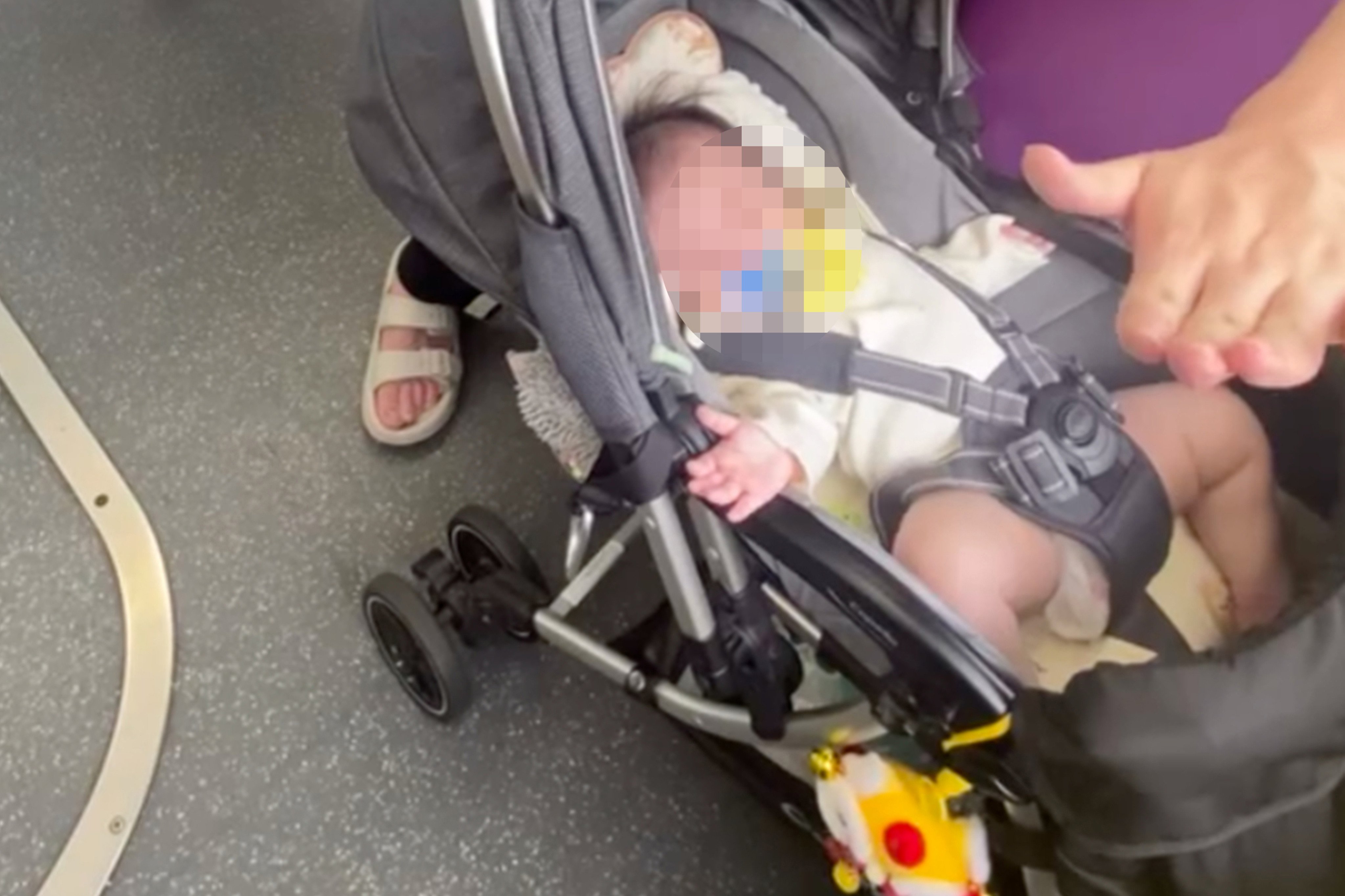 The man is seen in the video slapping the child’s foot repeatedly. Photo: Threads