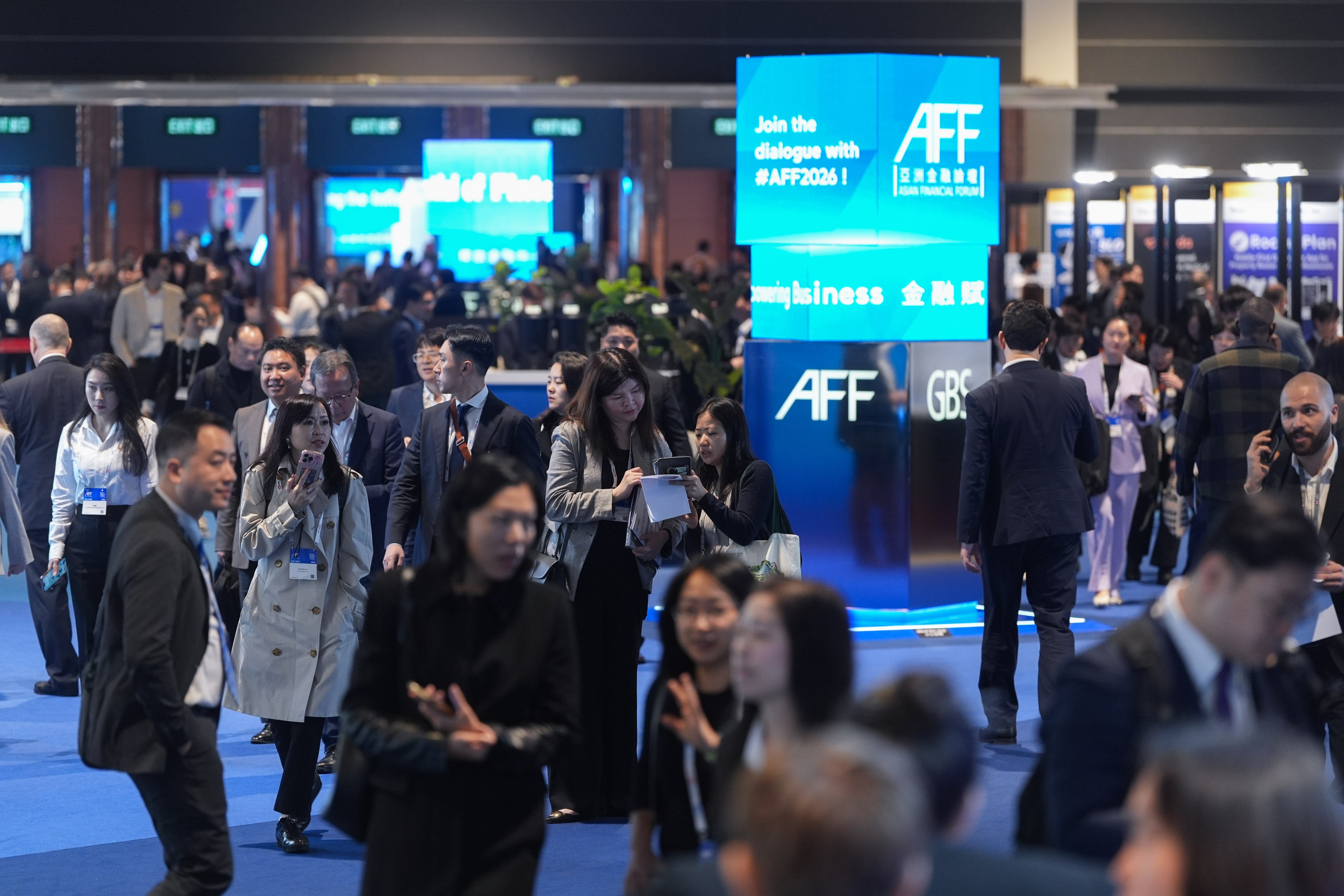 Visitors attend the 19th Asian Financial Forum at the Hong Kong Convention and Exhibition Centre in Wan Chai. Photo: Eugene Lee