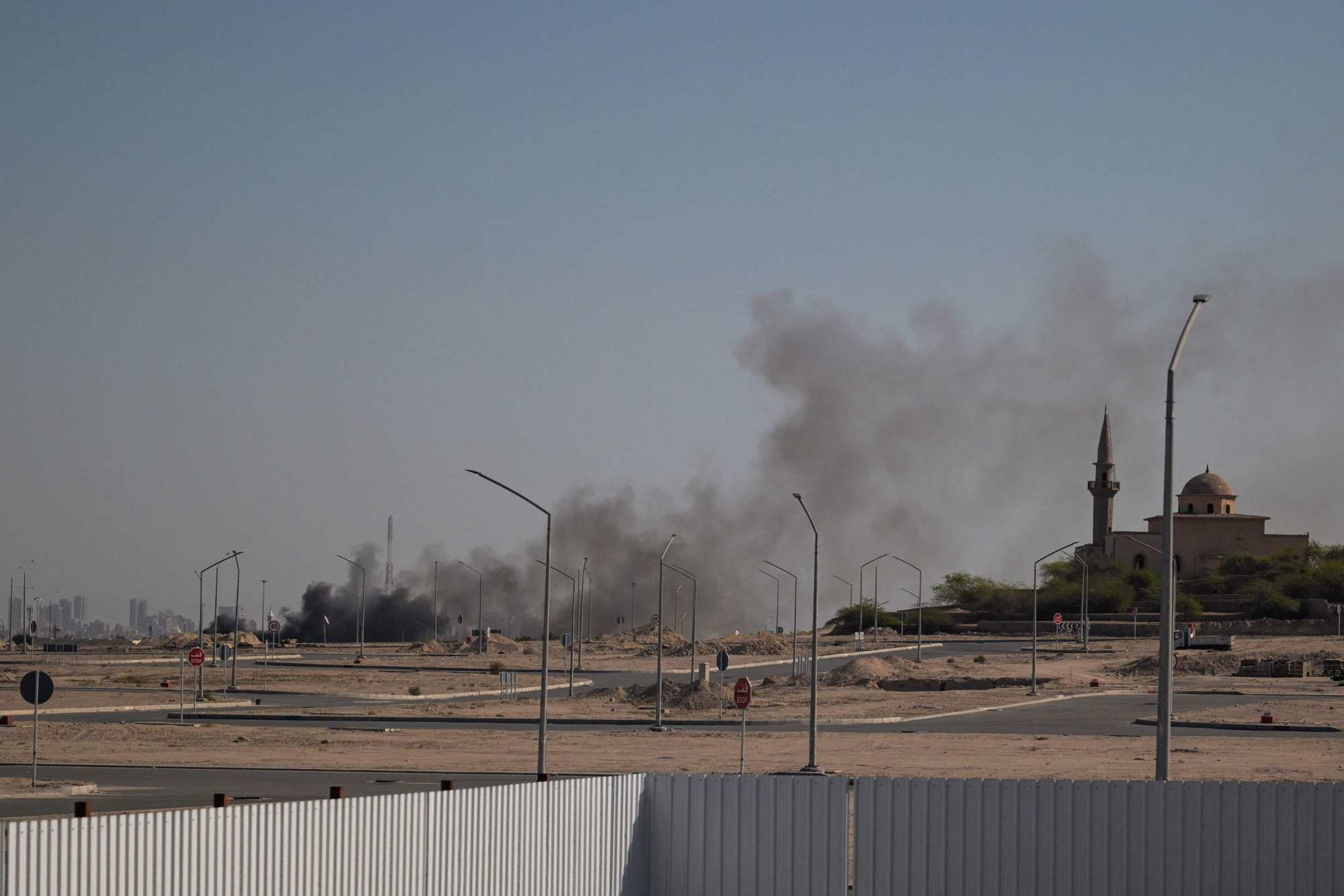 Smoke rises from a reported Iranian strike in the area where the US embassy is located in Kuwait City. Photo: AFP