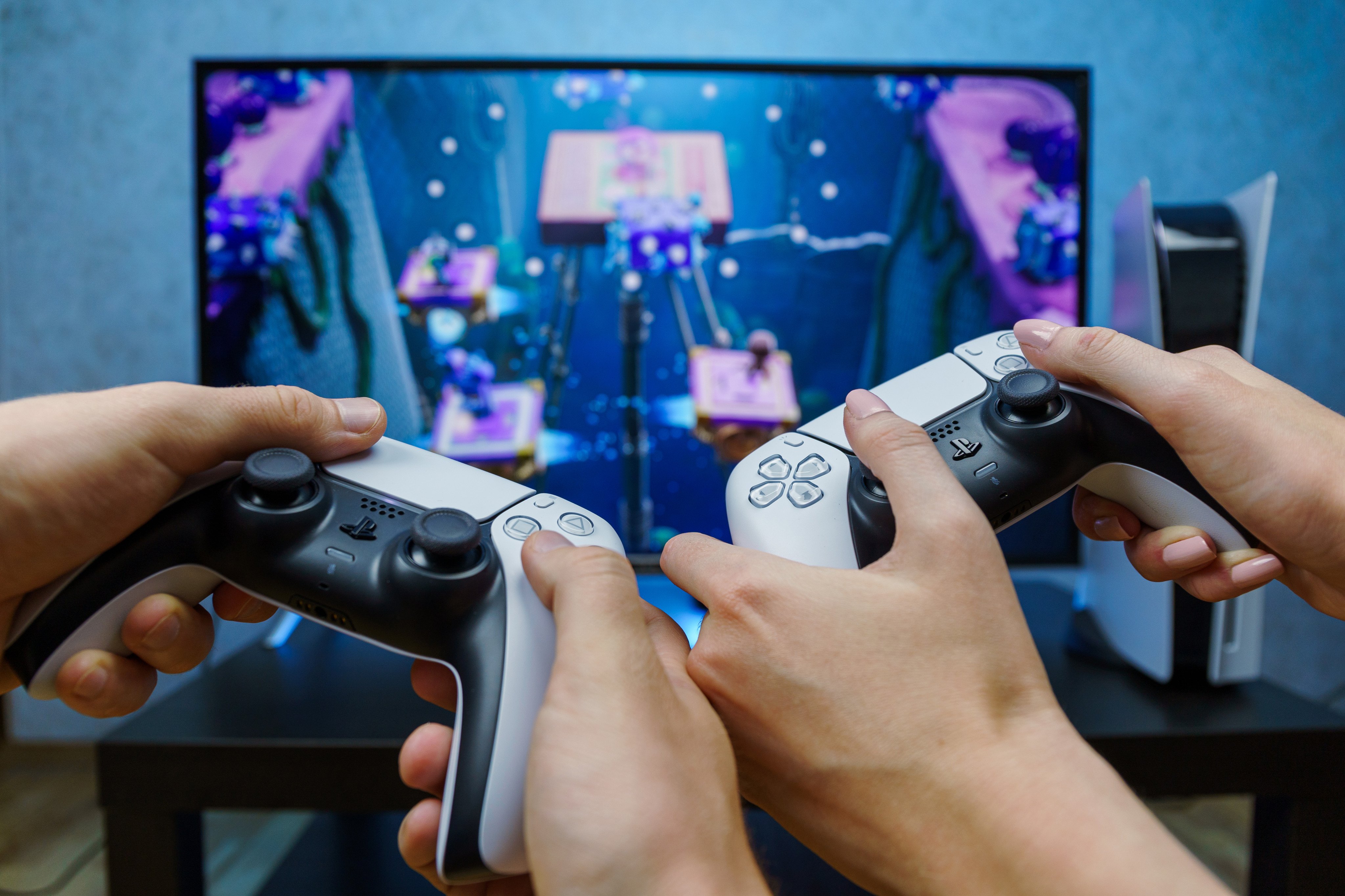 Gamers play on Sony’s PlayStation 5. Photo: Shutterstock