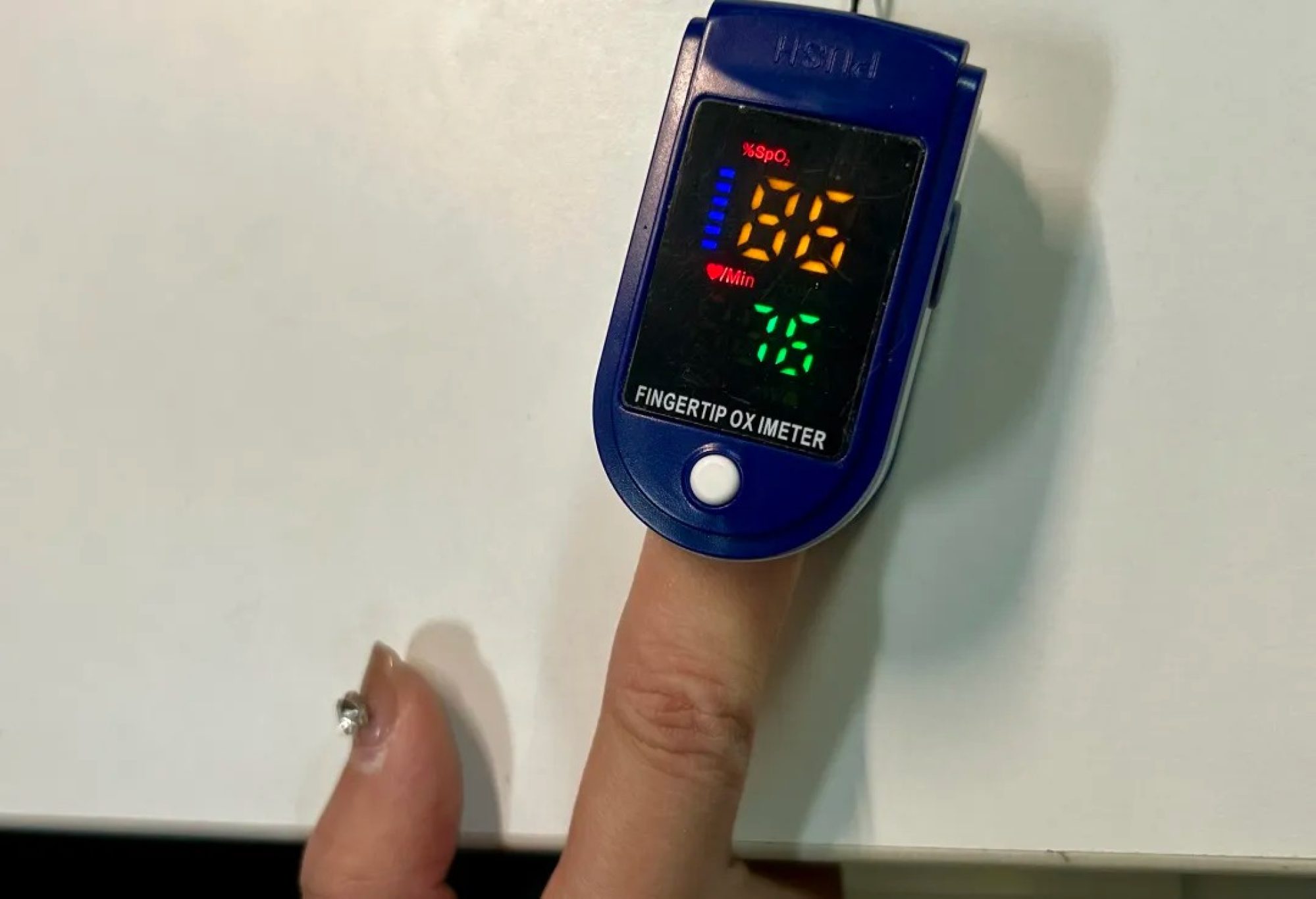 A fingertip pulse oximeter is a small, non-invasive device that clips onto the finger to measure blood oxygen saturation and pulse rate. Photo: Handout