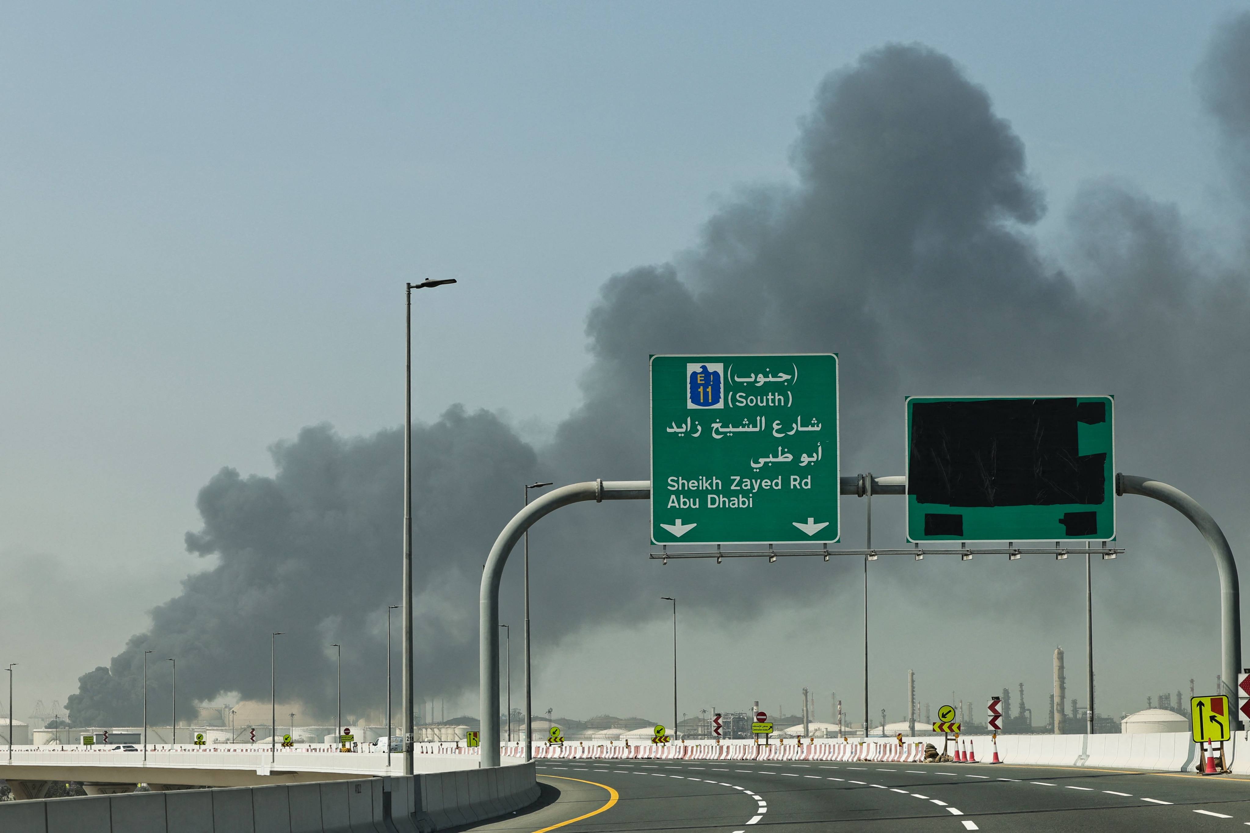 A plume of smoke rises from the port of Jebel Ali following a reported Iranian strike in Dubai on Sunday. Photo: AFP