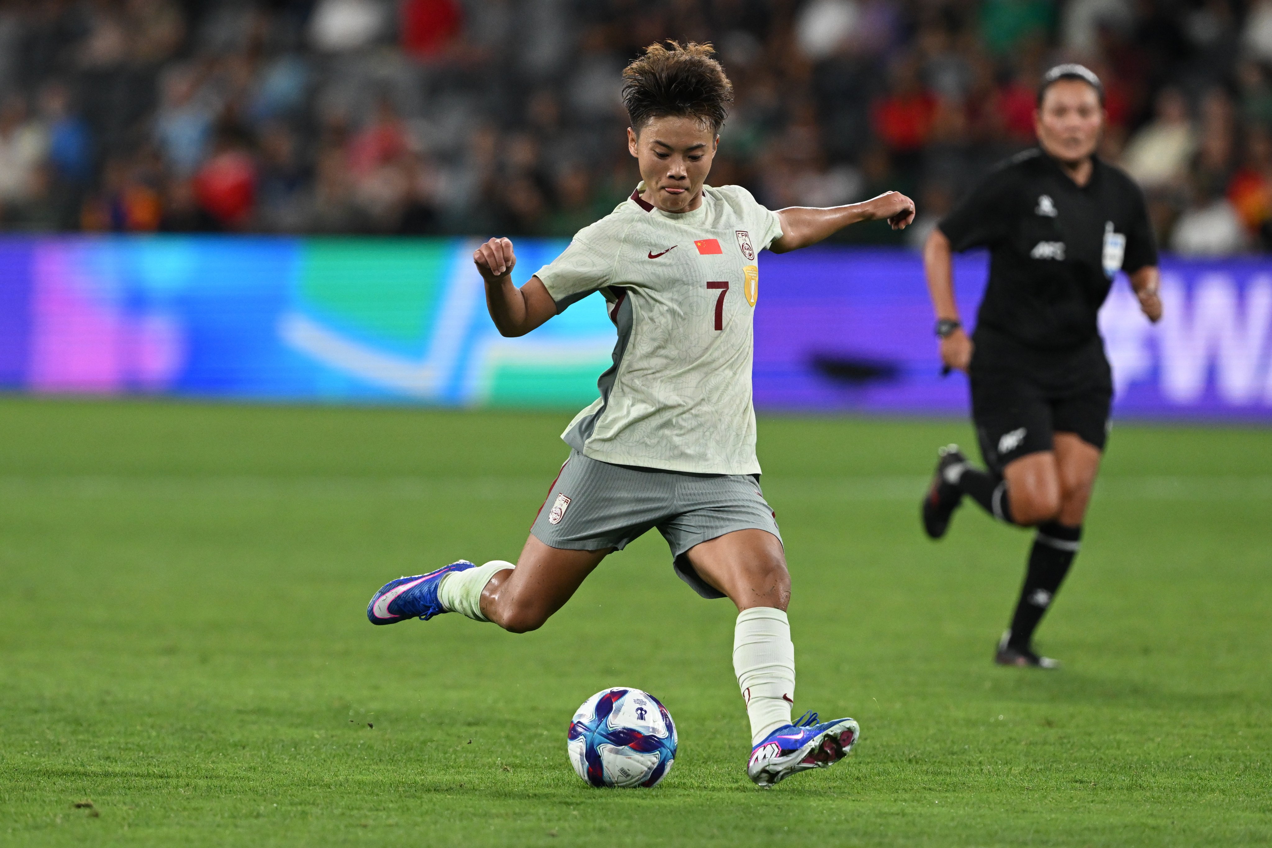 Wang Shuang scores China’s first goal against Bangladesh in the Women’s Asian Cup Group B clash at CommBank Stadium in Sydney. Photo: EPA