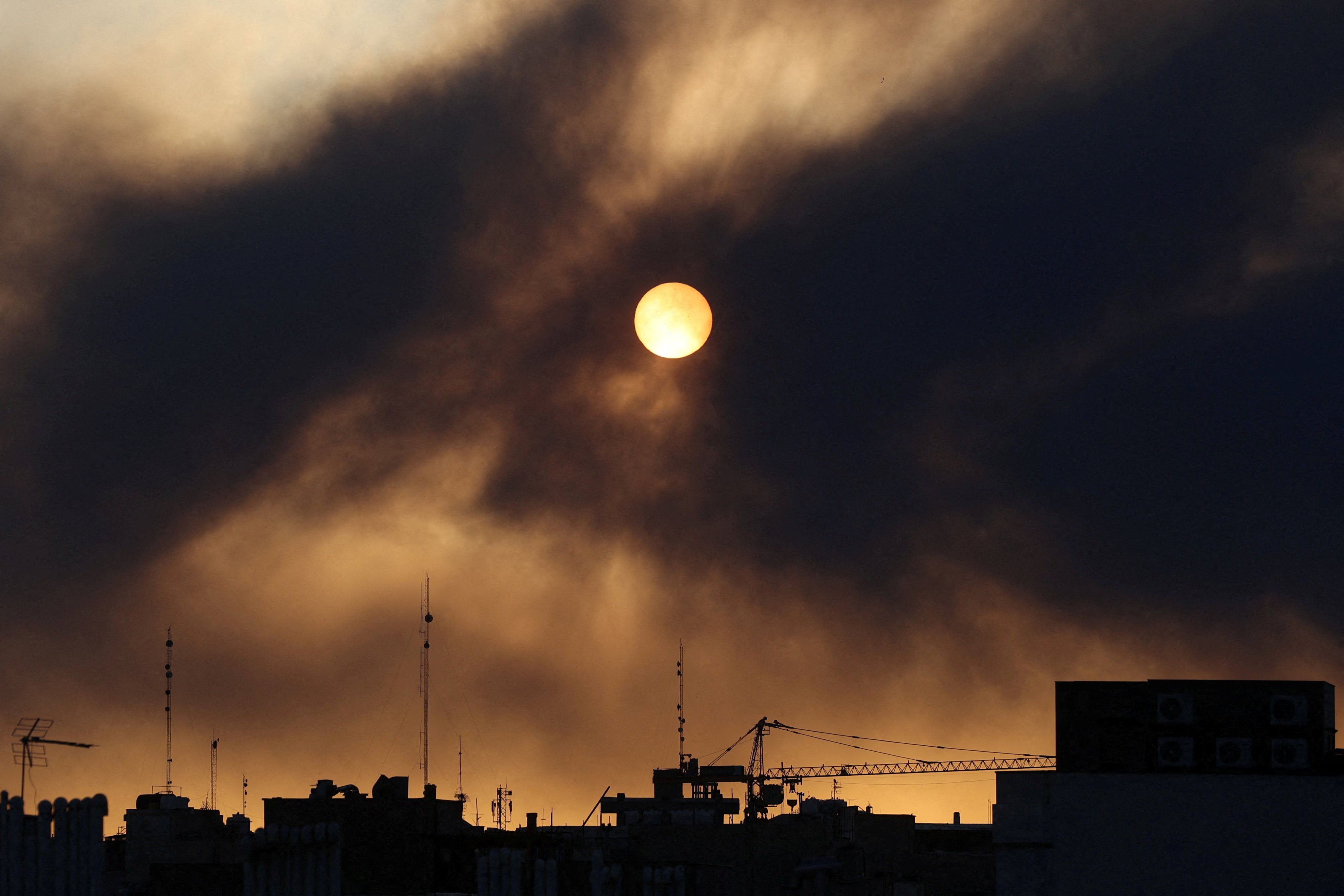 Smoke rises following an explosion in Tehran on Tuesday following air strikes by Israel and the US. Photo: WANA via Reuters