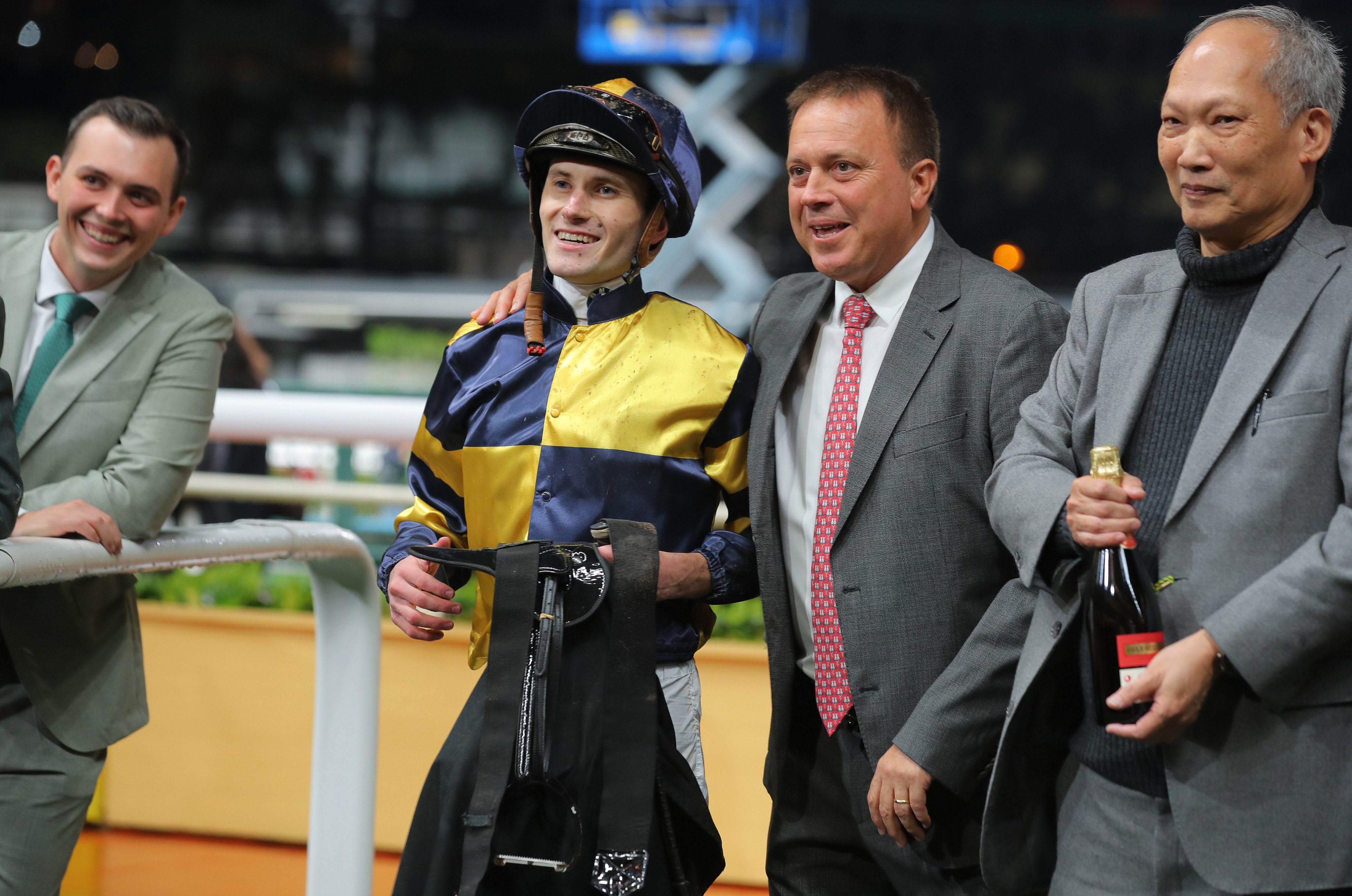 Jockey Luke Ferraris and trainer Caspar Fownes (second from right) celebrate Verbier’s win at Happy Valley. Photos: Kenneth Chan