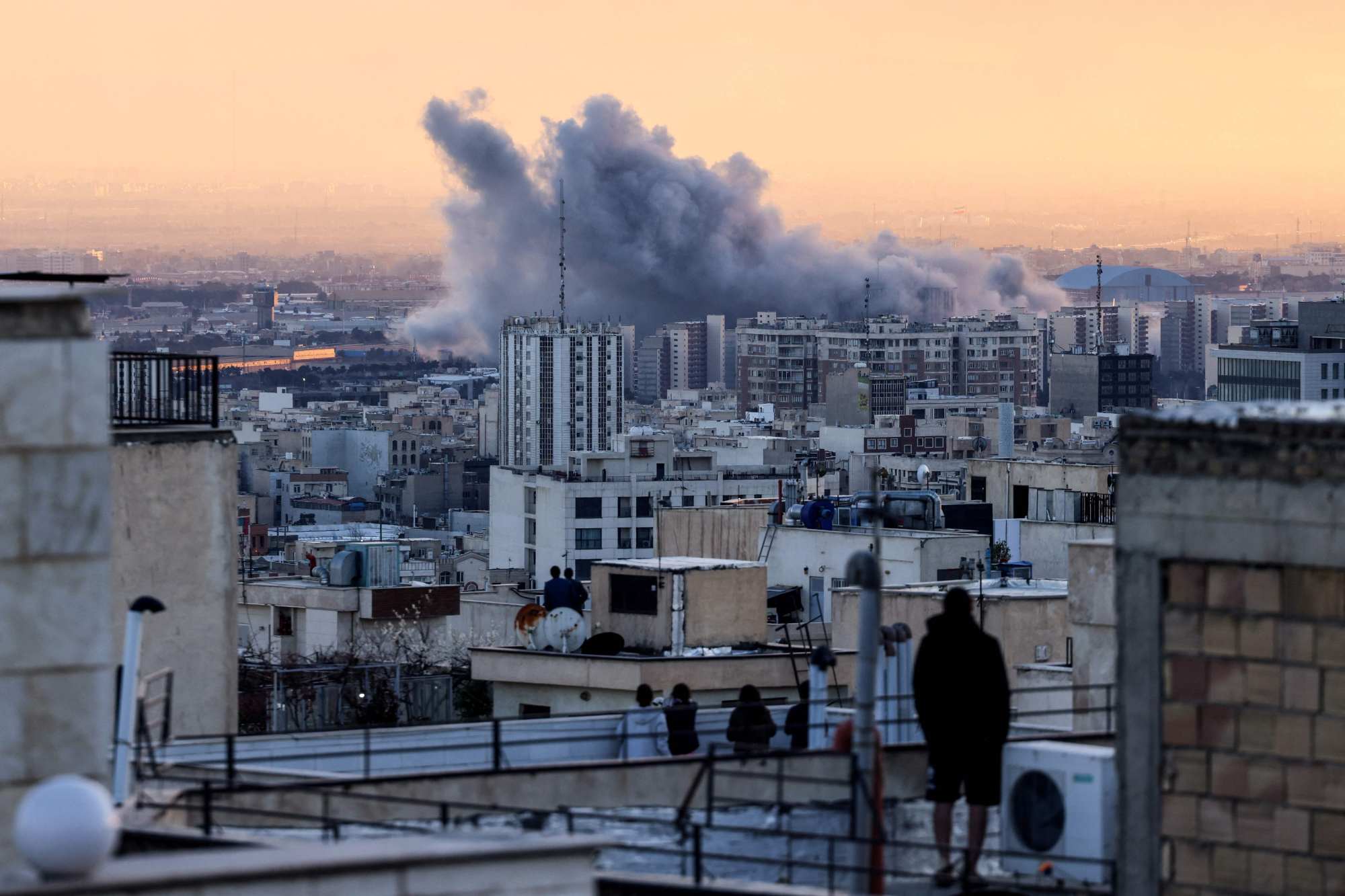 A plume of smoke rises after a strike on the Iranian capital Tehran. Photo: AFP A plume of smoke rises after a strike on the Iranian capital Tehran. Photo: AFP