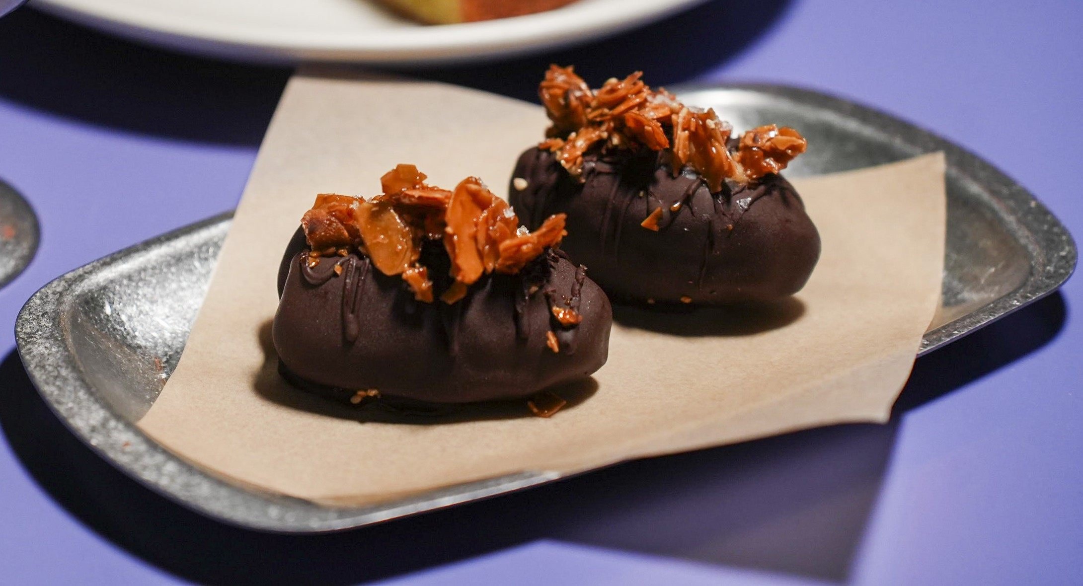 Dark chocolate covered stuffed medjool dates at Migas Hong Kong. Photo: Handout