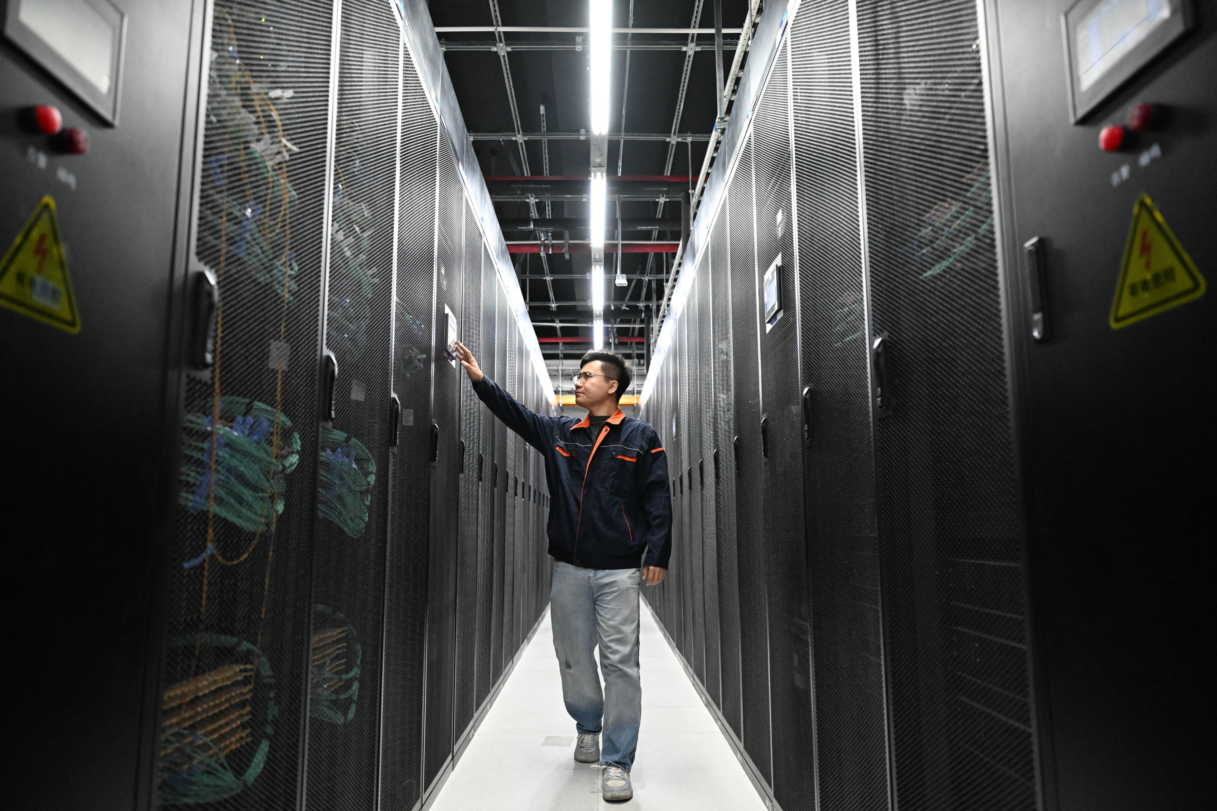 An engineer inspects the intelligent computing servers at a China Telecom facility at the Beijing-Tianjin Industrial New City Gaocun Data Intelligence Innovation Park in Tianjin’s Wuqing district last month. Photo: Xinhua