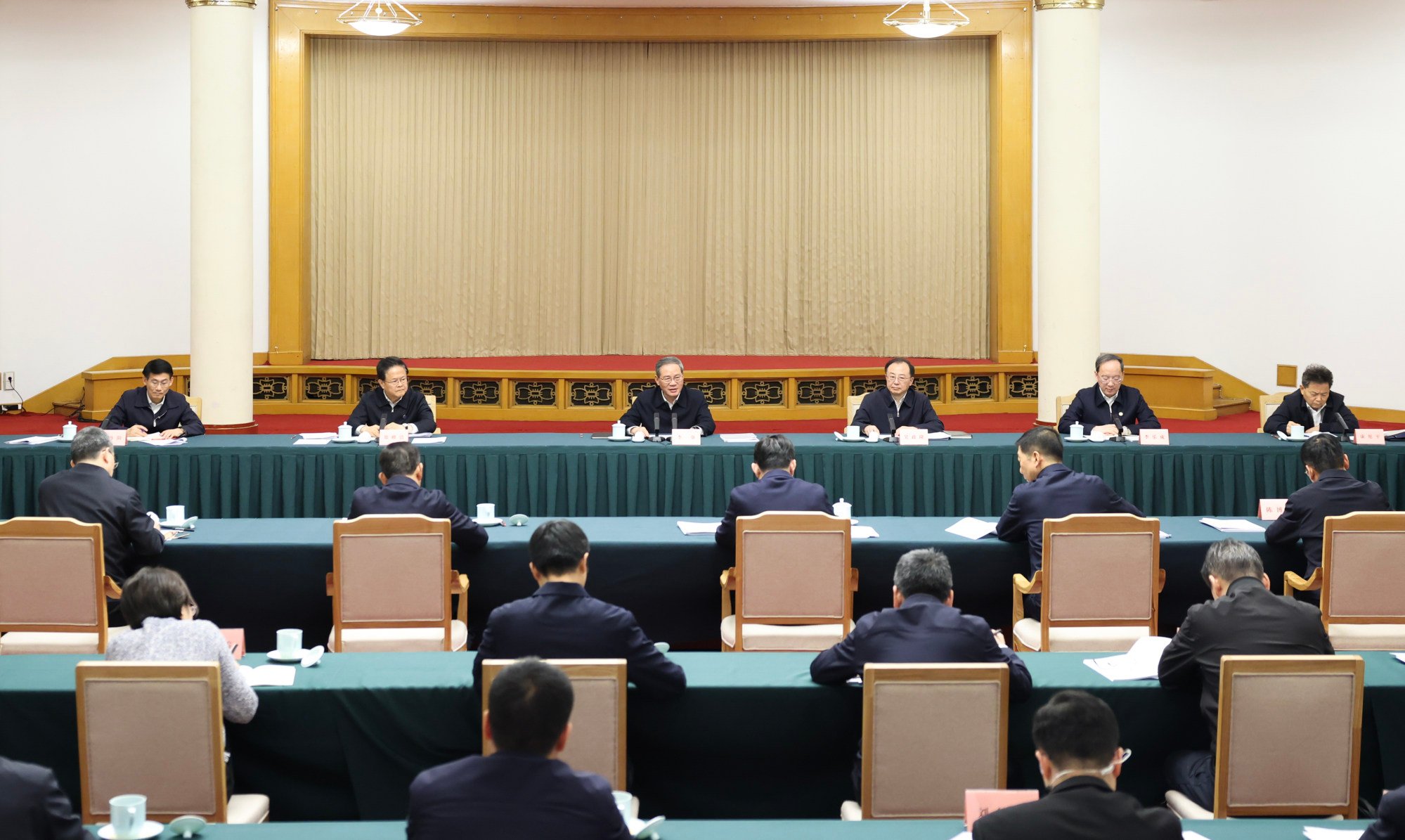 Chinese Premier Li Qiang chairs a symposium to solicit opinions on the draft government work report and draft outline of the 15th five-year plan, in east China’s Shandong province on February 2. Photo: Xinhua
