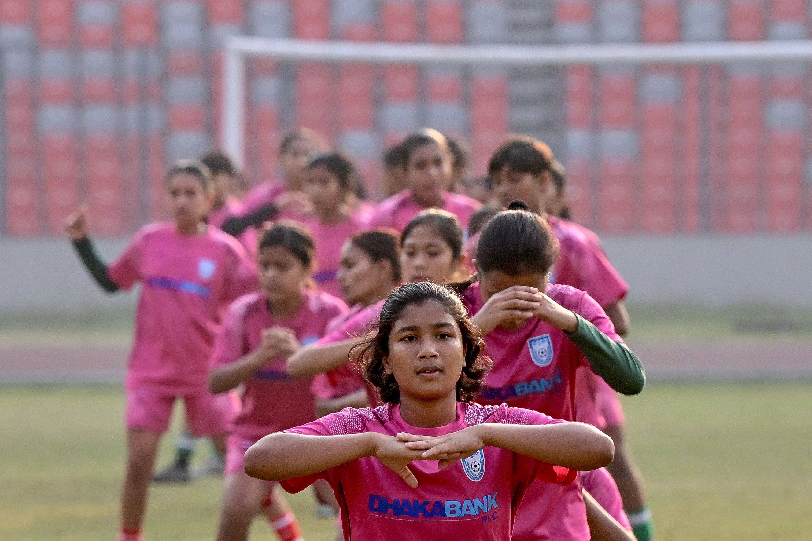 Bangladesh’s women’s football team makes history by qualifying for their first-ever Asian Cup amid social challenges. Photo: AFP