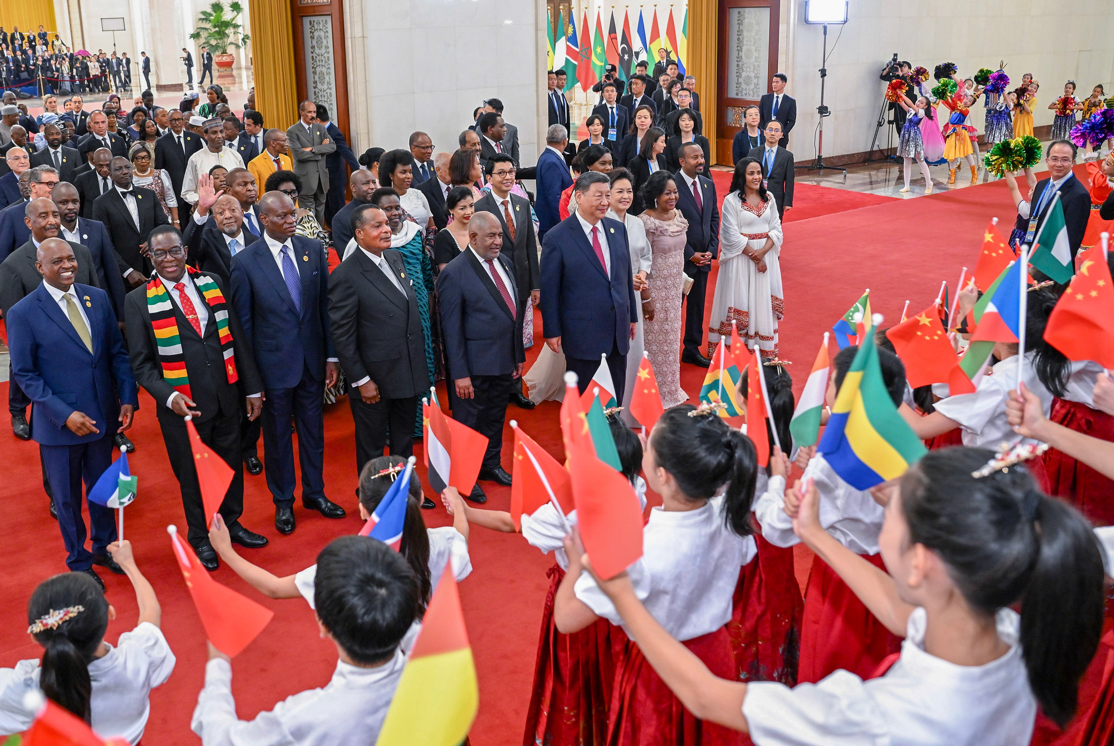 Guests attending a China-Africa cooperation summit are greeted by children on their way to a banquet hosted by Chinese President Xi Jinping at the Great Hall of the People in Beijing on September 4, 2024. Photo: Xinhua