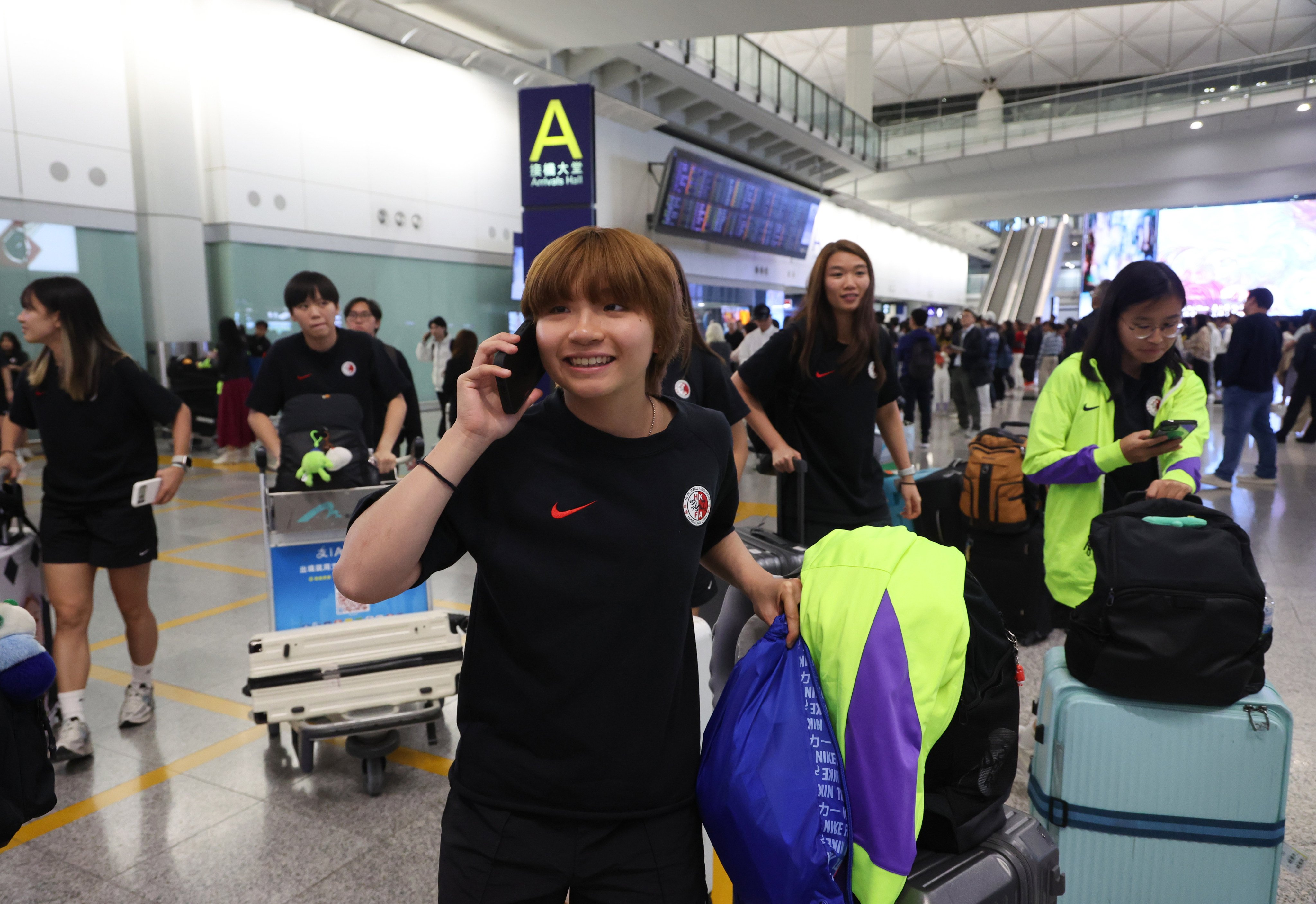 After several anxious days, the players were happy to be back in the city. Photo: Dickson Lee